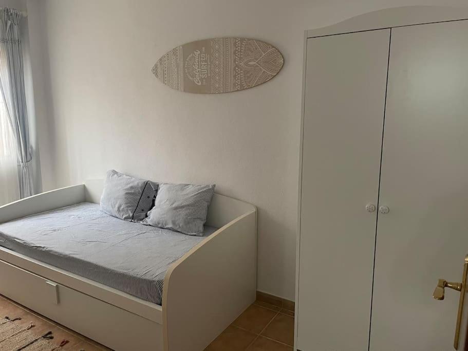 Apartamento con porche y piscina