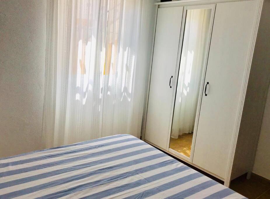 Apartamento con porche y piscina