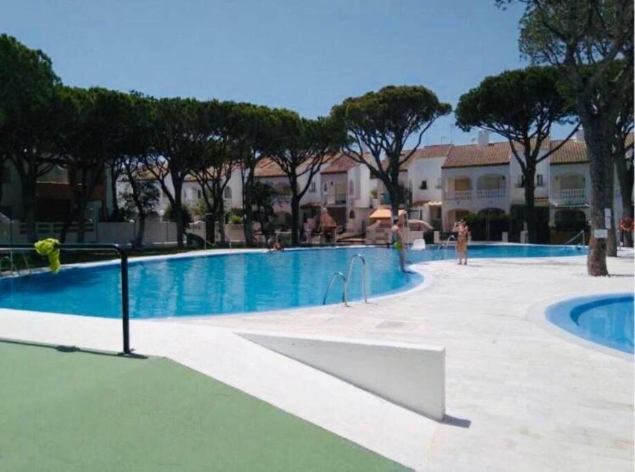 Apartamento con porche y piscina
