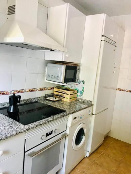 Apartamento con porche y piscina