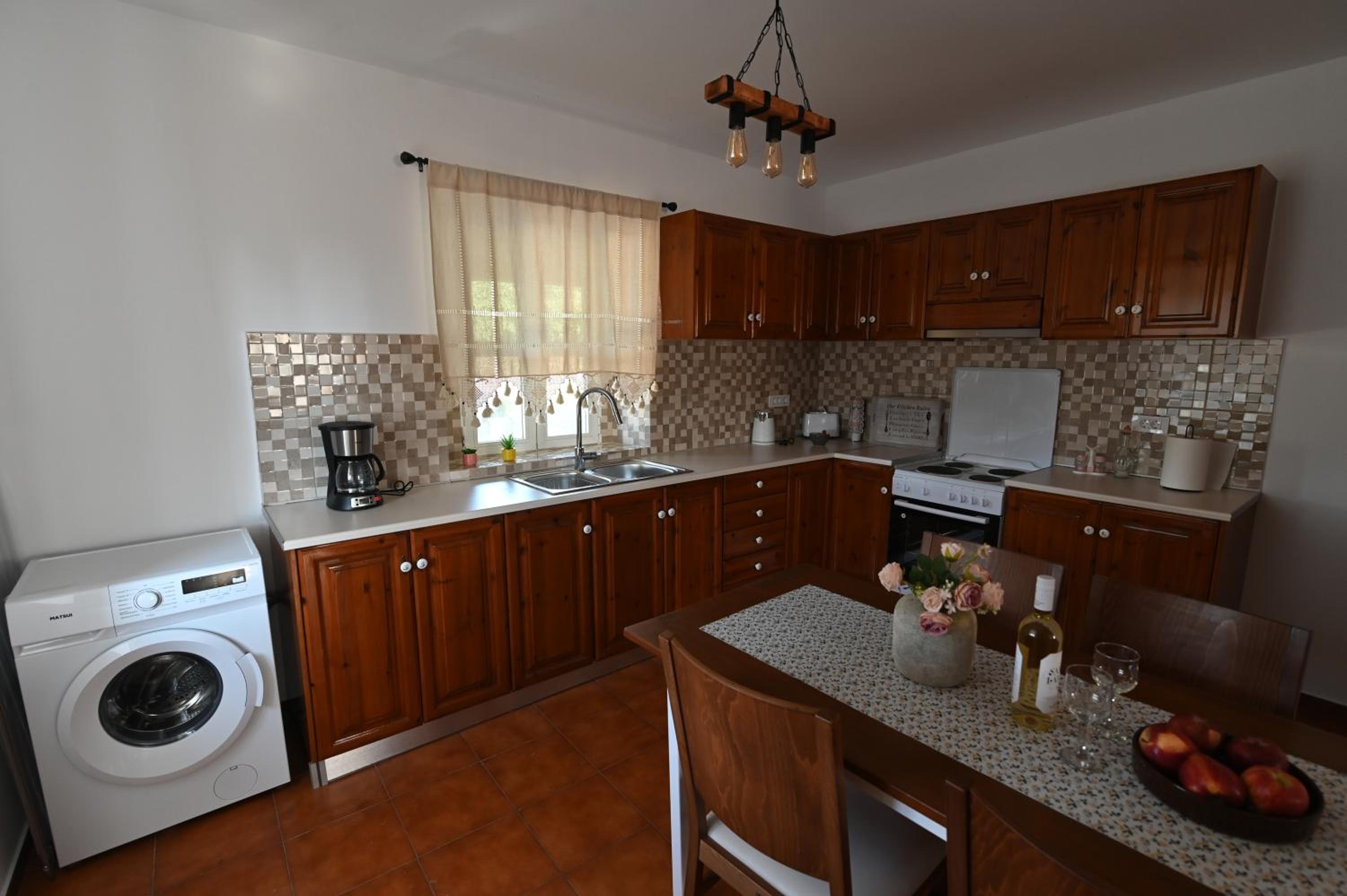Traditional Kos villa with swimming pool, lawn yard and bbq view 3