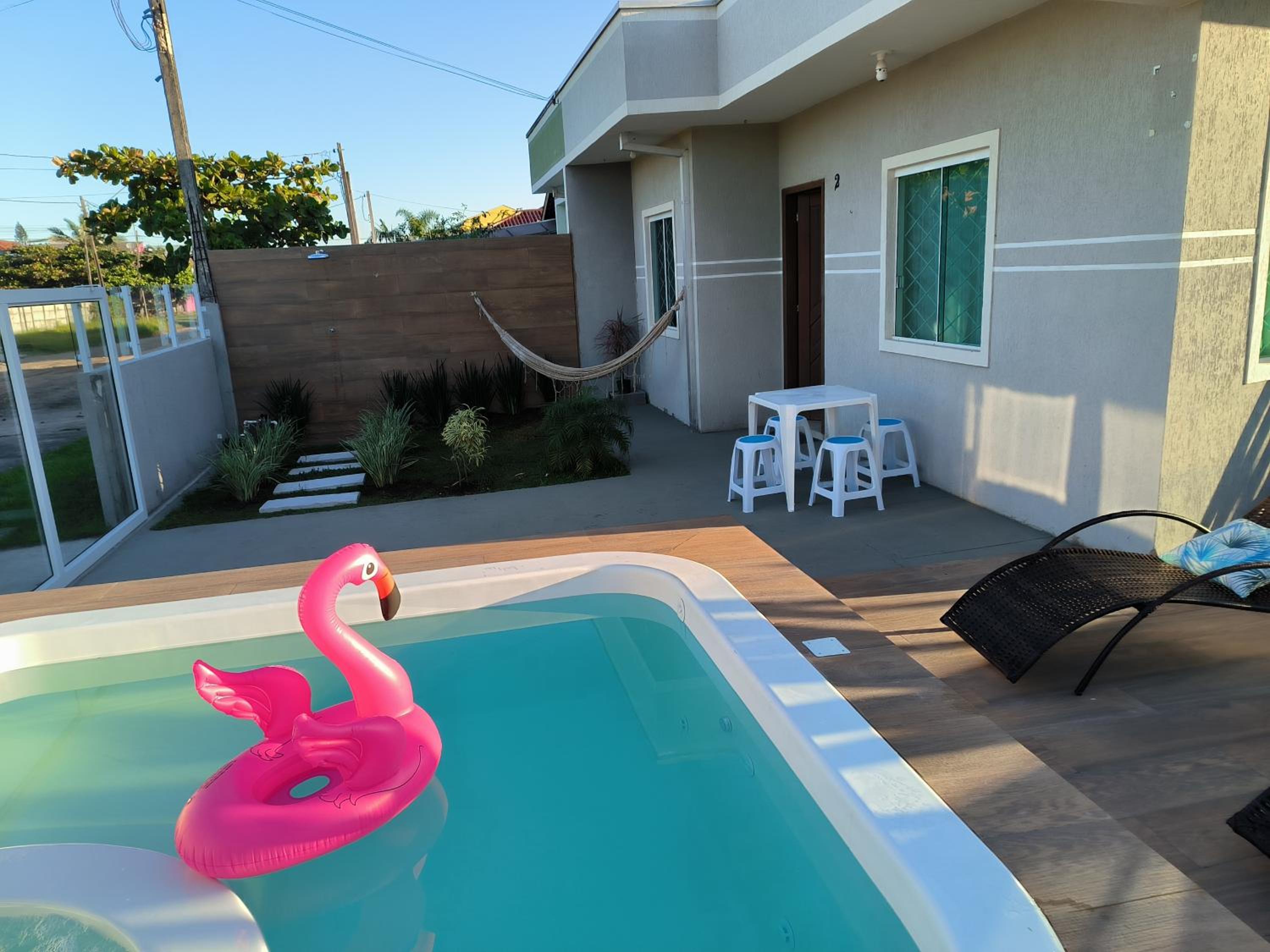 Casa alguns passos do mar com piscina e hidro