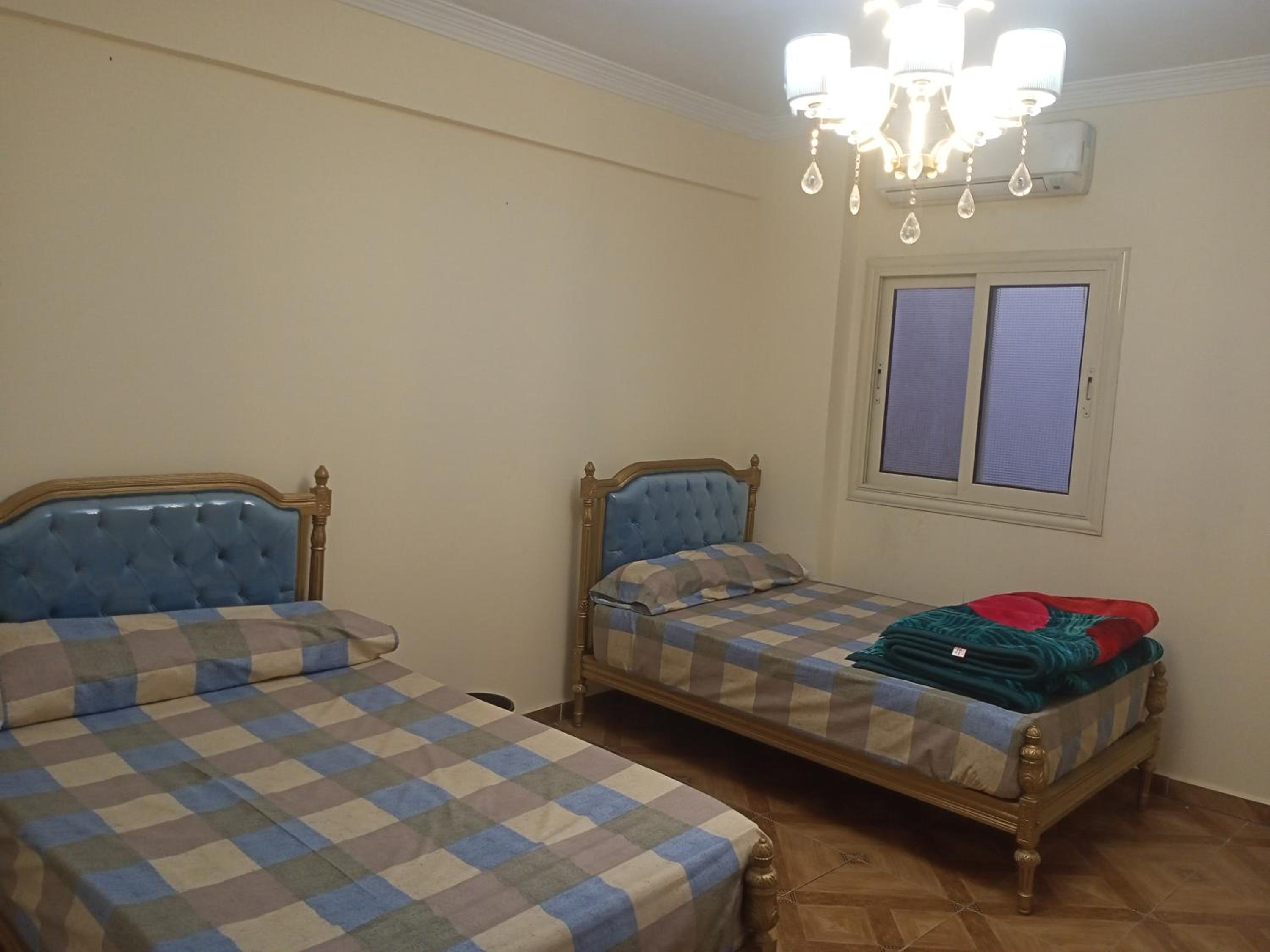 19 Abu Al-Hol Tourist Street, Al-Haram, Nazlet Al-Samman