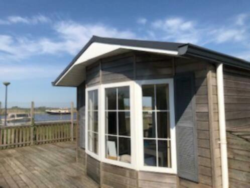 Waterchalet number 6 Recreationpark Yn'e Lijte Grou met ligplaats boot