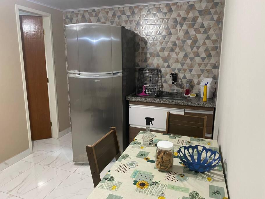 Casa CENTRO com Estacionamento-500m da rua do lazer, ideal p casais ou até 4 pessoas