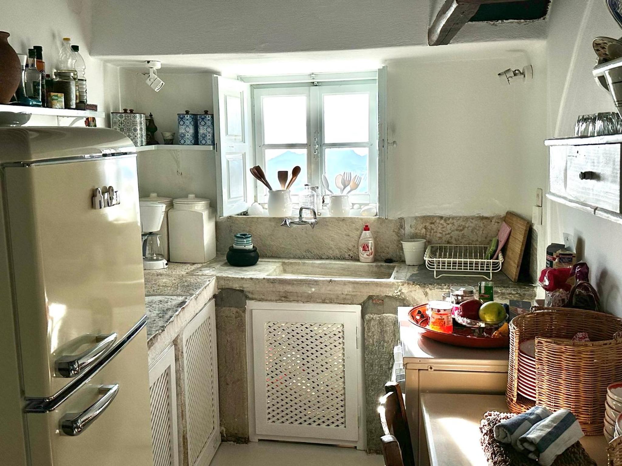 Restored traditional white house in Naxos view 4