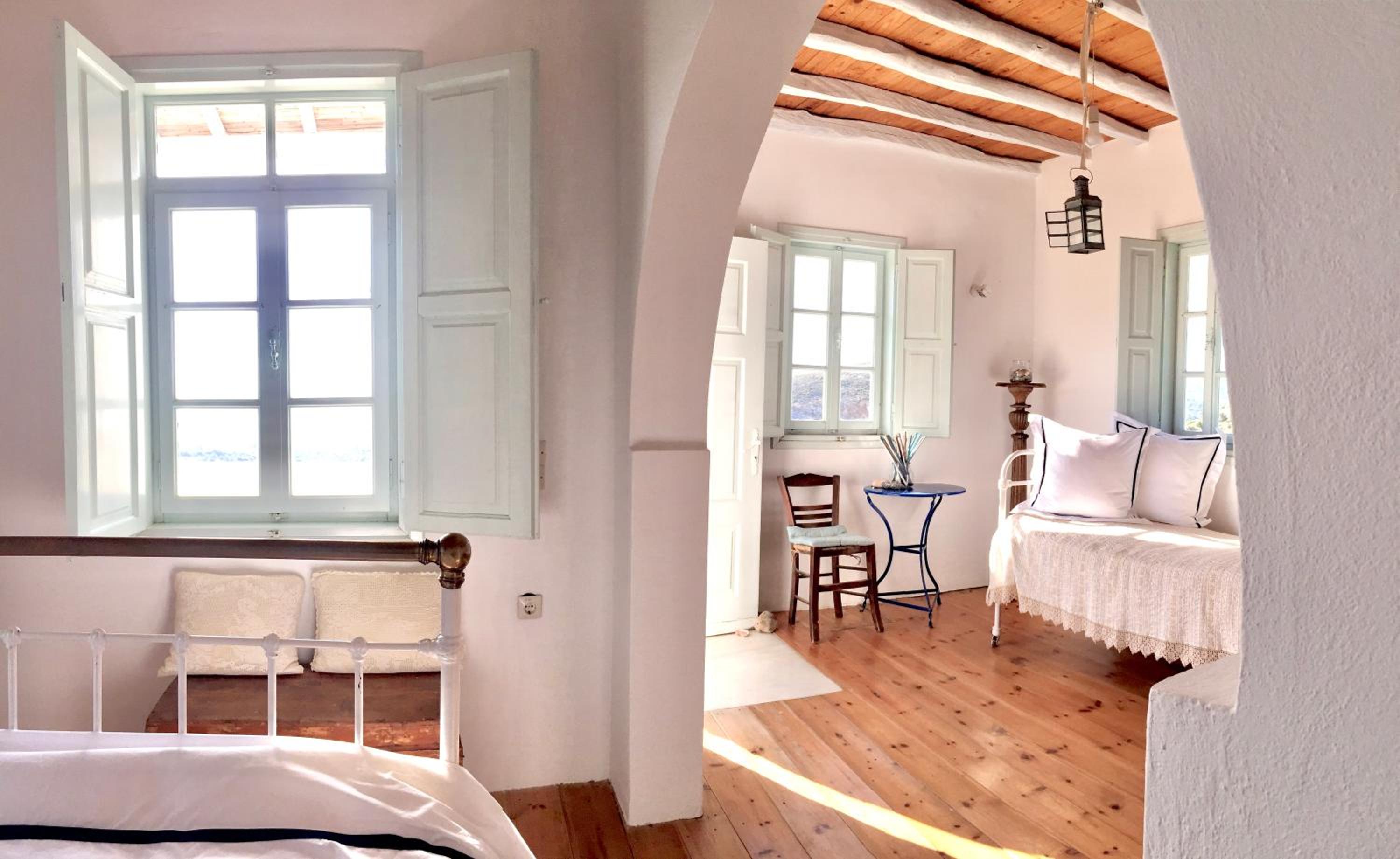 Restored traditional white house in Naxos view 5