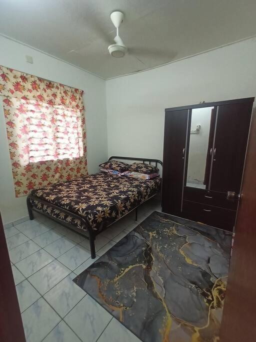 Homestay Tokwan Besar & Selesa! photo 8