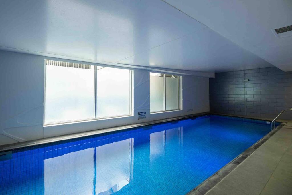 City apartment, pool & carpark