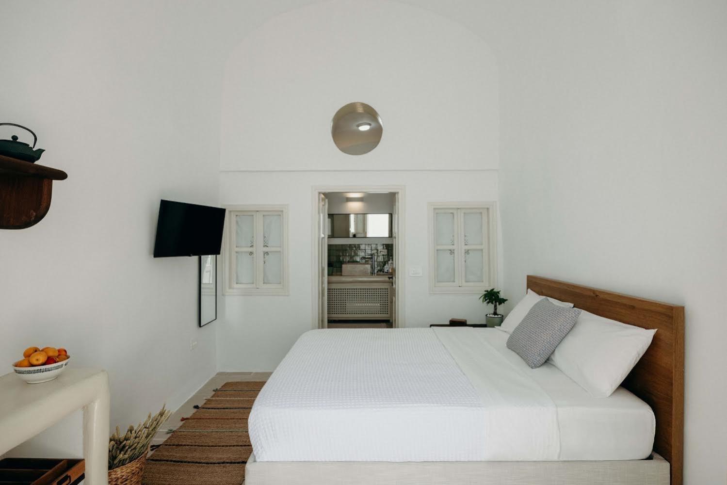 Villa Patitiri cave house with private pool in Megalochori Santorini view 2