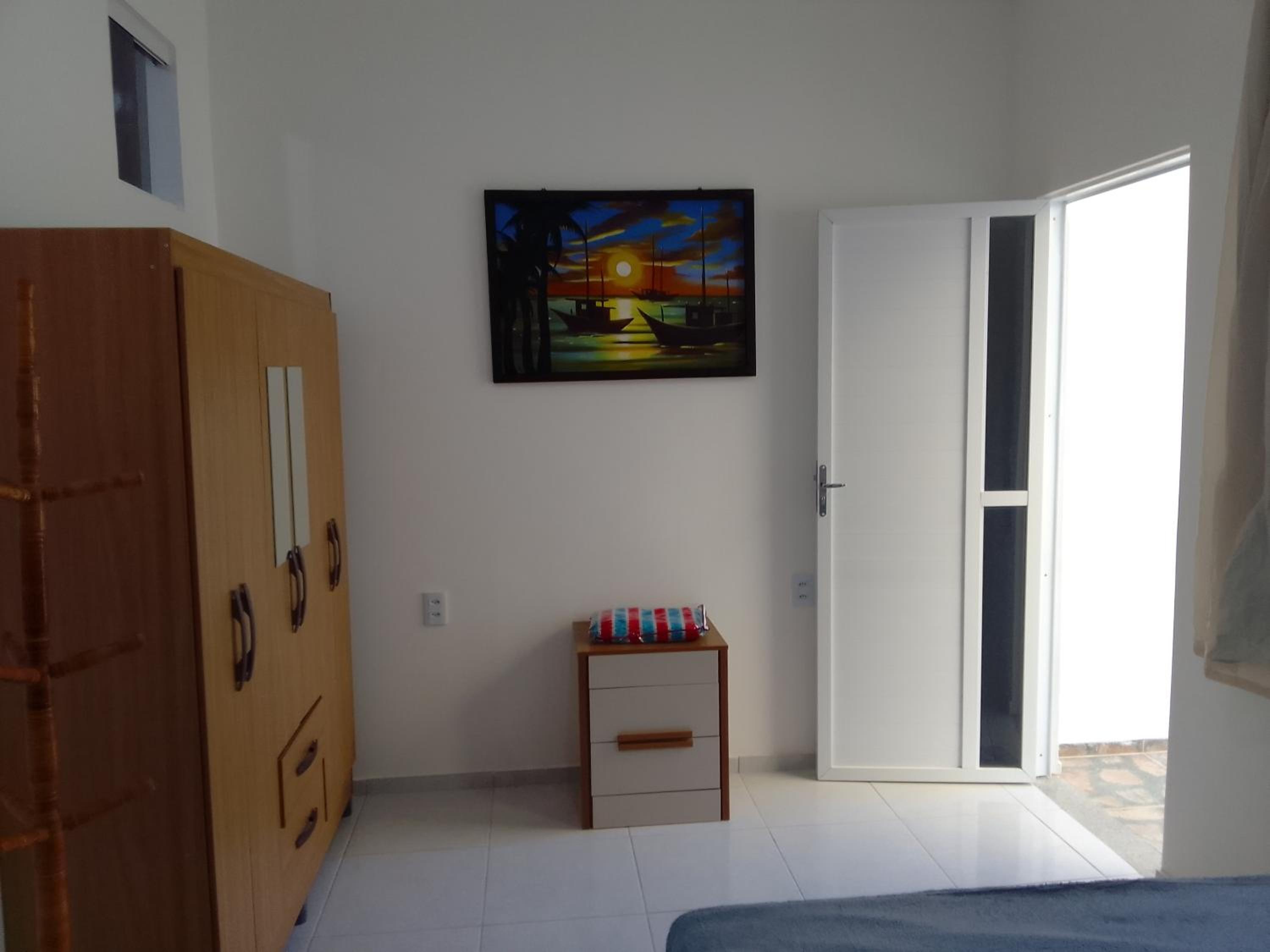 Estrela Apartamento 2 terreo - Quarto e sala com cozinha americana na praia do prea-Ce