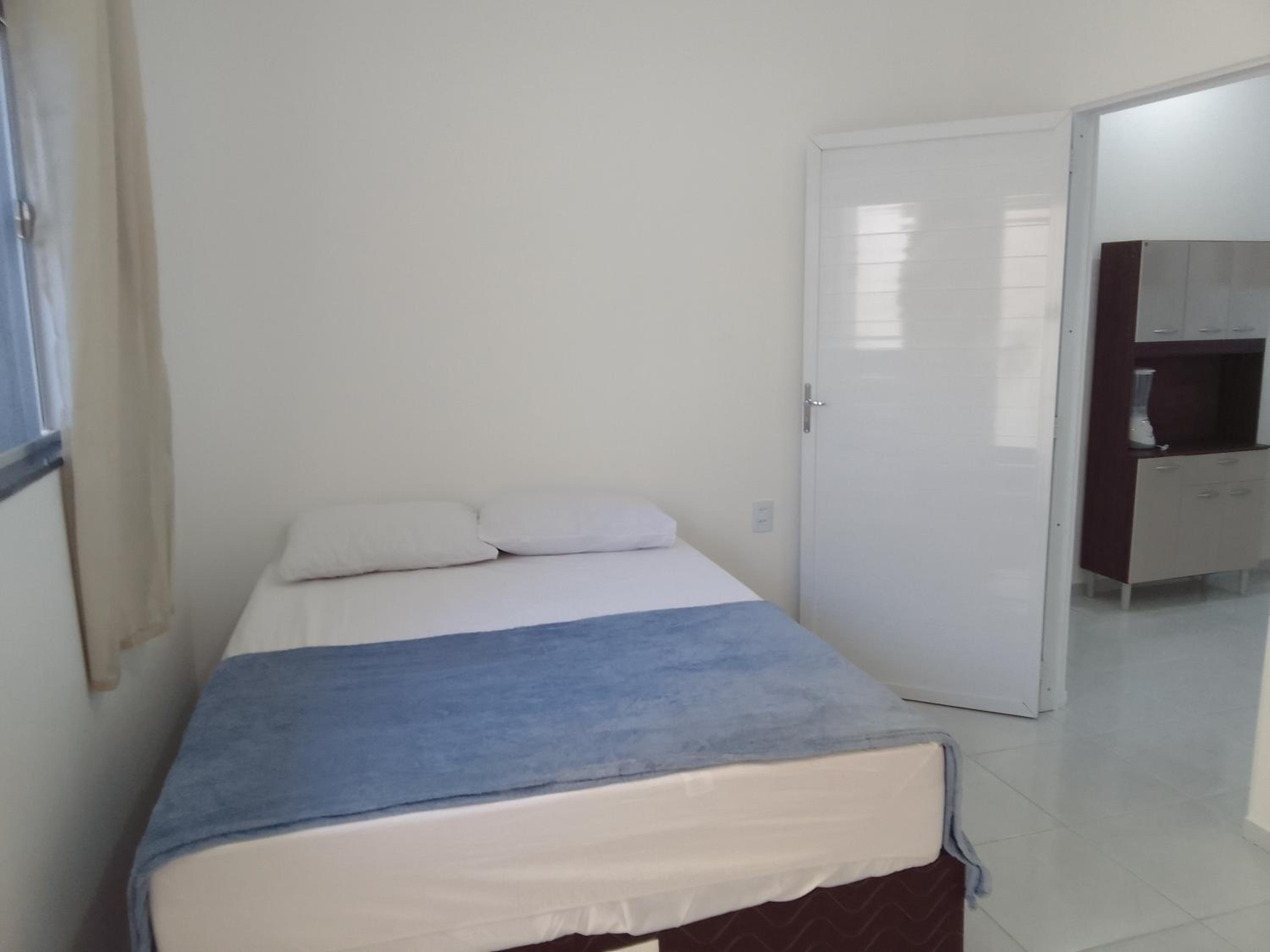 Estrela Apartamento 2 terreo - Quarto e sala com cozinha americana na praia do prea-Ce