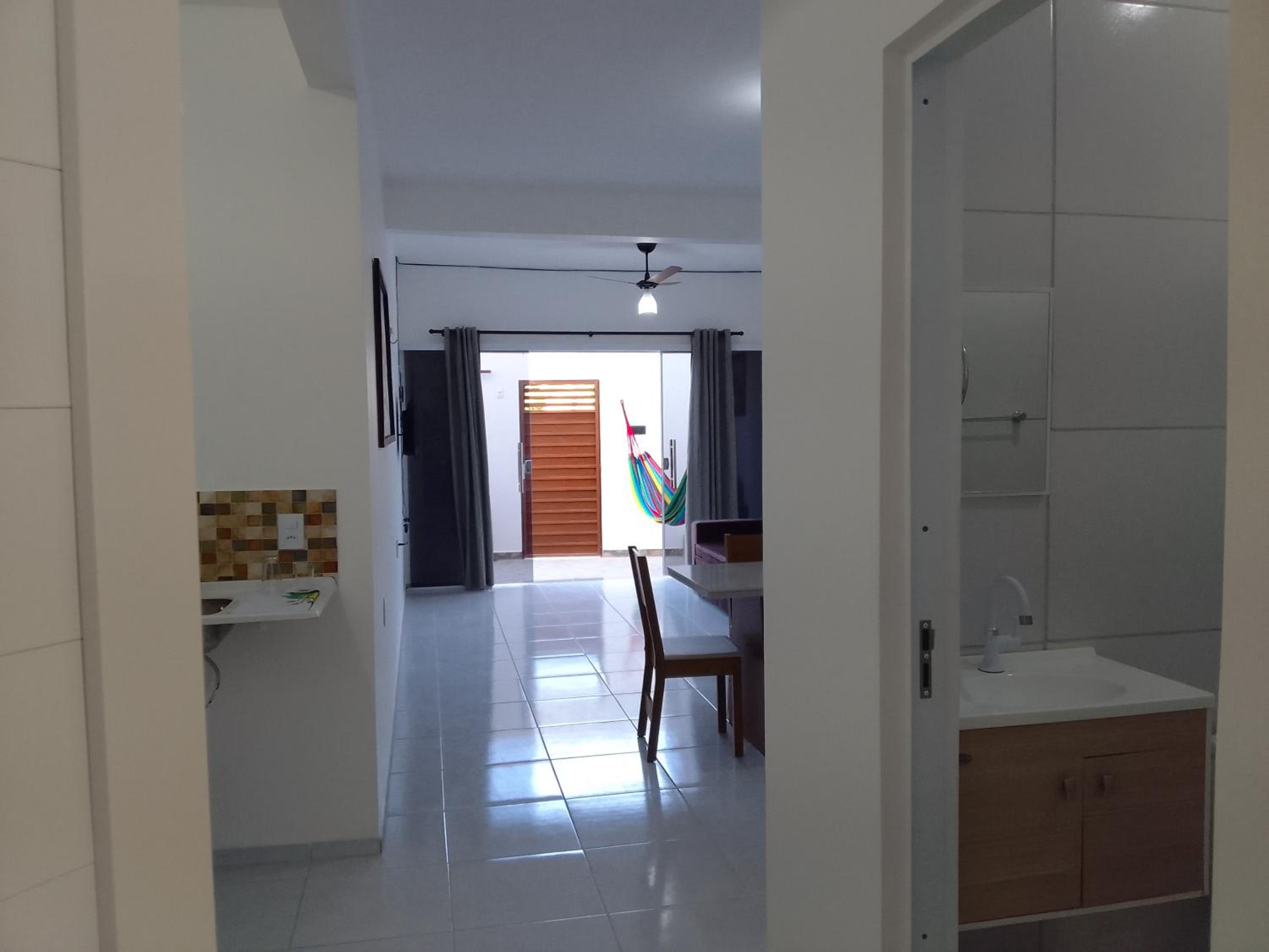 Estrela Apartamento 2 terreo - Quarto e sala com cozinha americana na praia do prea-Ce