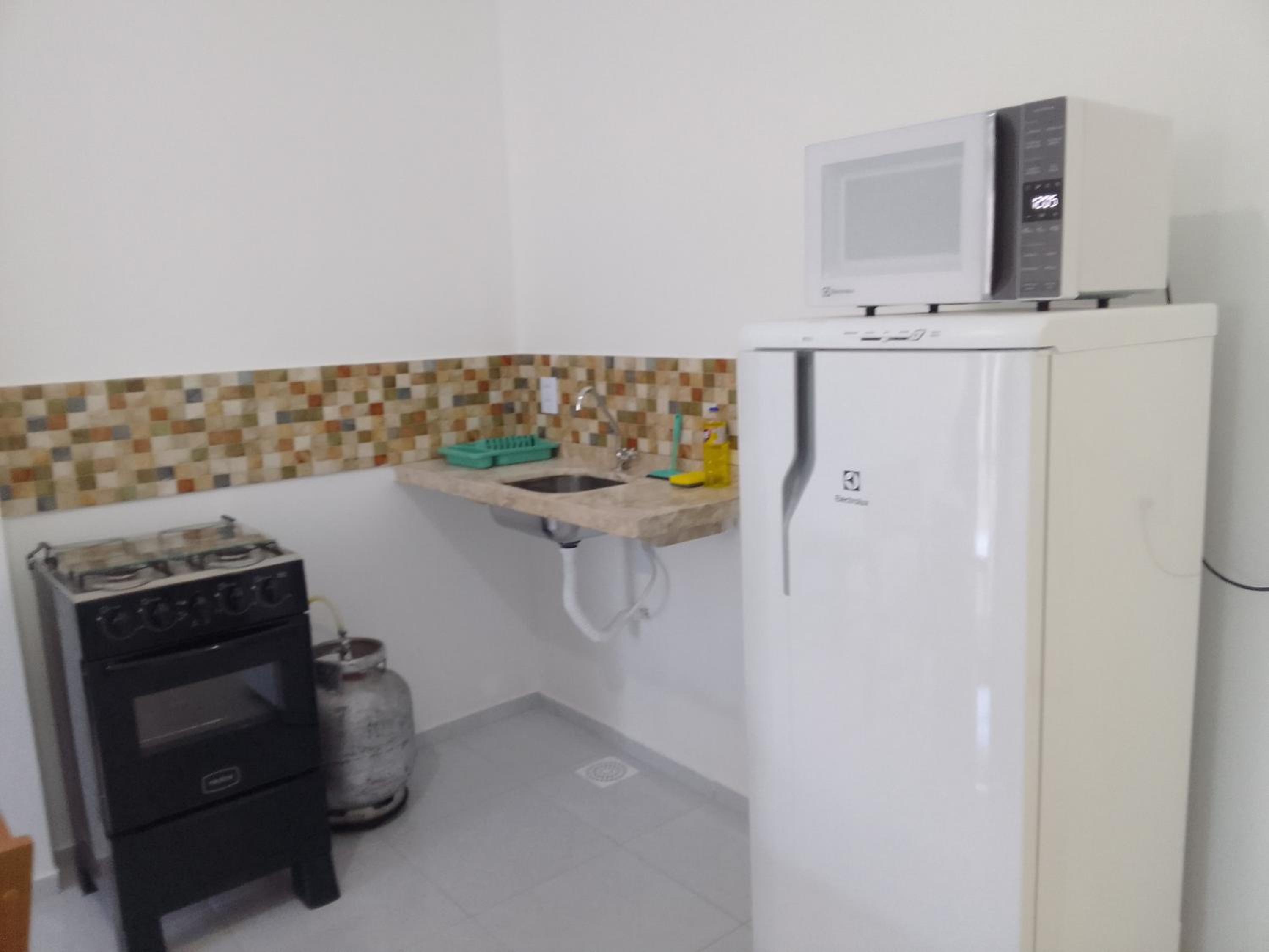 Estrela Apartamento 2 terreo - Quarto e sala com cozinha americana na praia do prea-Ce
