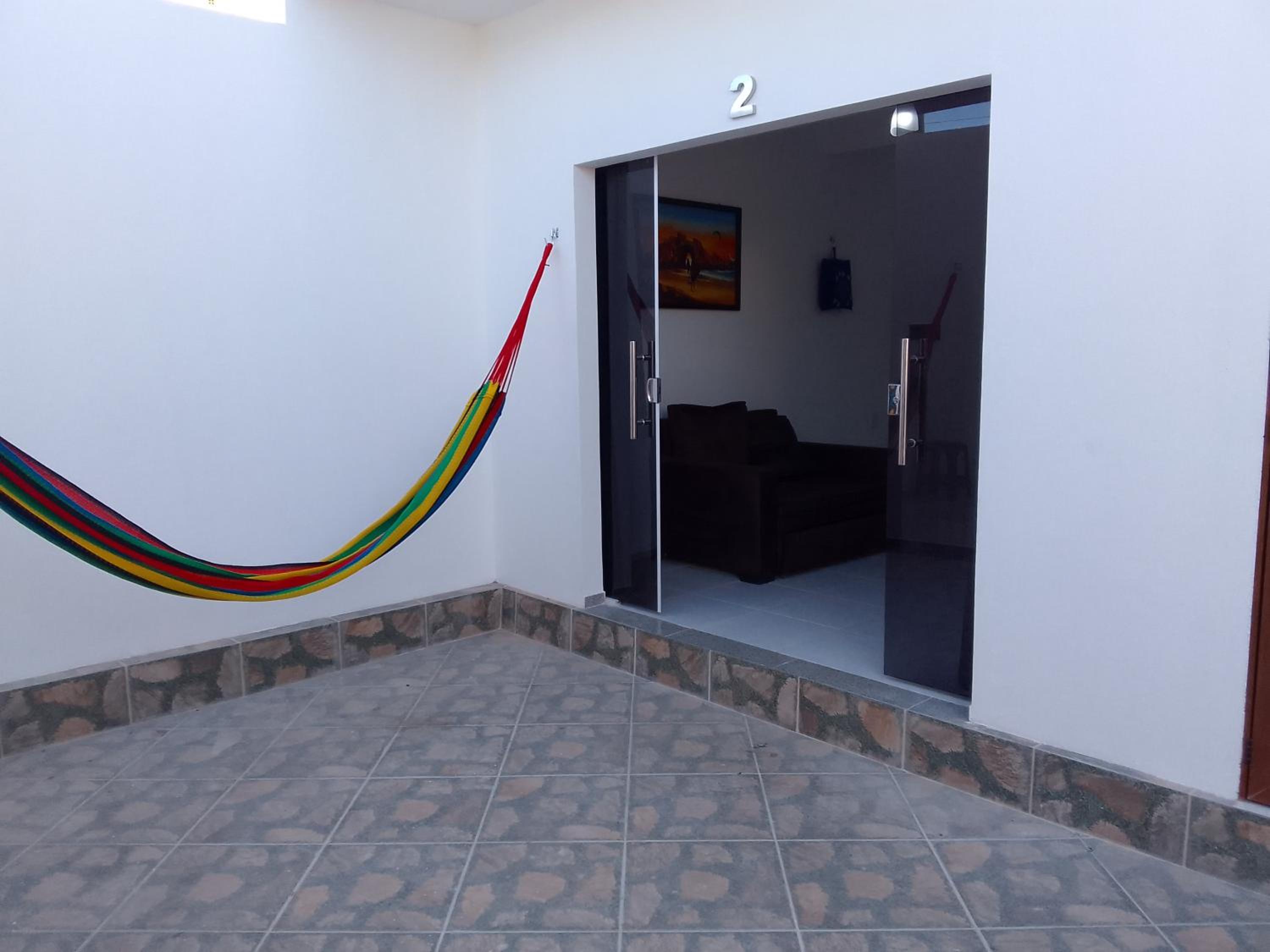 Estrela Apartamento 2 terreo - Quarto e sala com cozinha americana na praia do prea-Ce