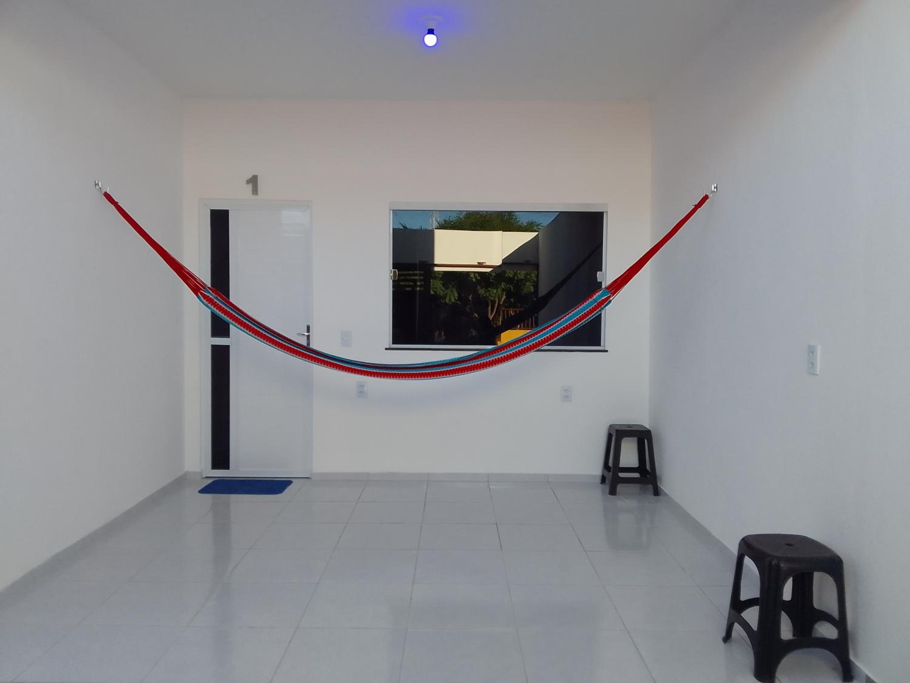 Casa do Bruno - Apartamento terreo - 1 - Terra - Quarto e sala com cozinha americana na praia do preá-CE