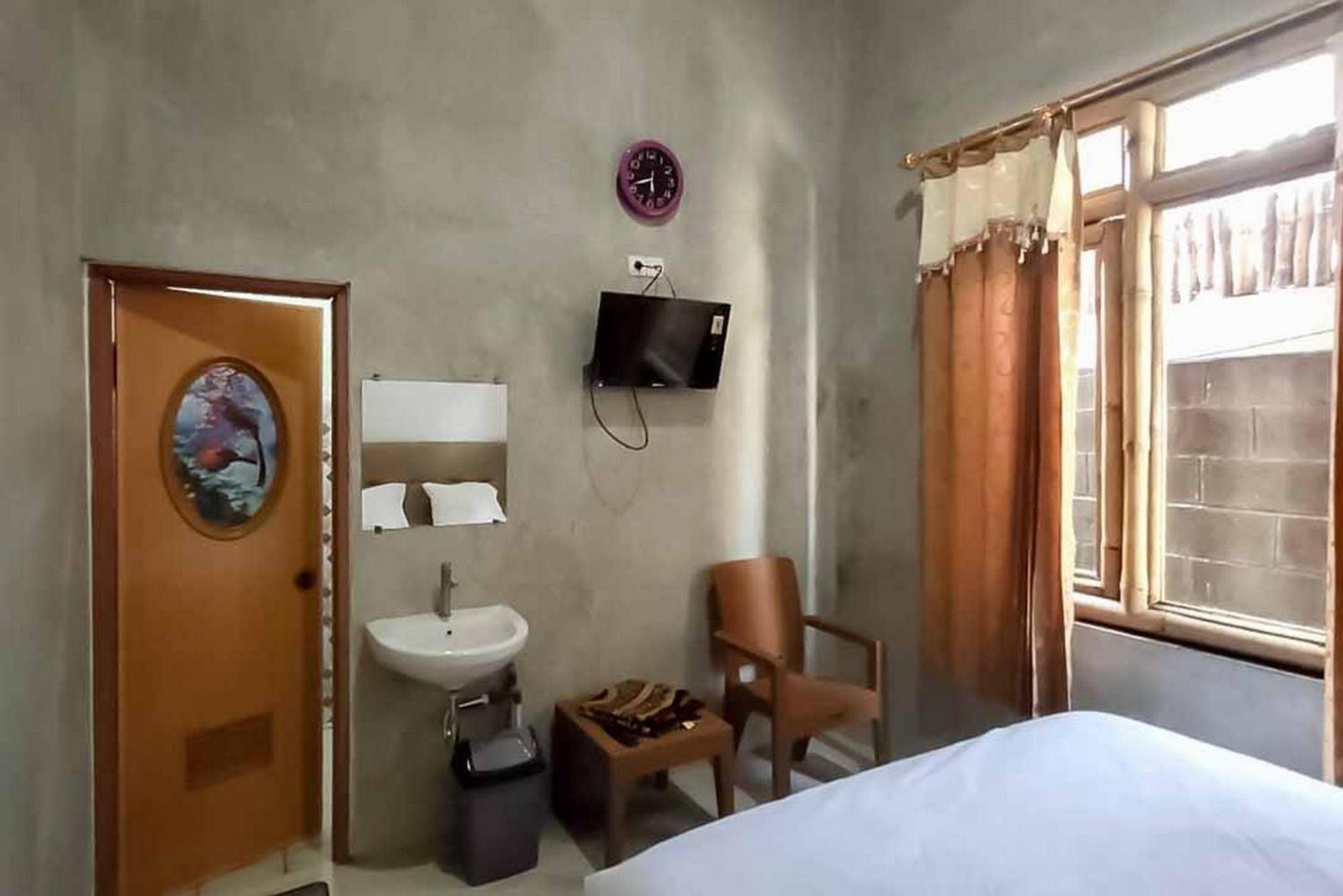 Sukawana Guest House Mitra RedDoorz