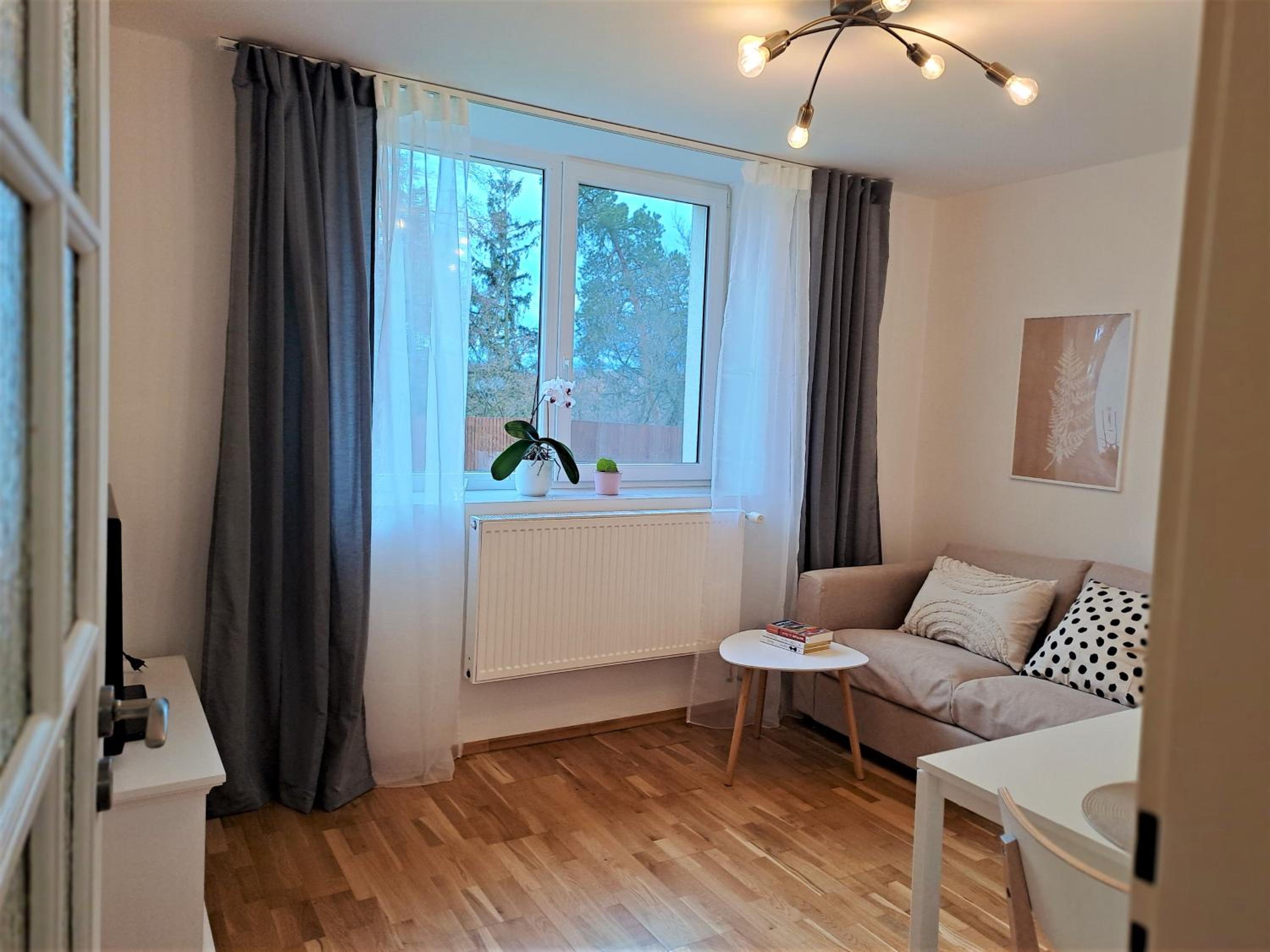 Apartmánový dům se zahradou v klidné části Prahy