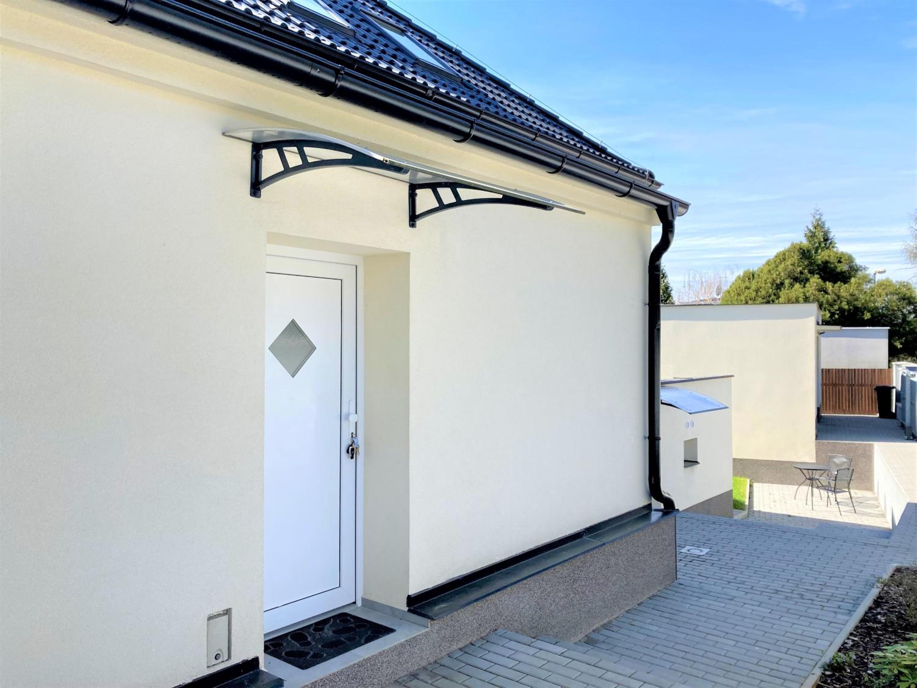 Apartmánový dům se zahradou v klidné části Prahy
