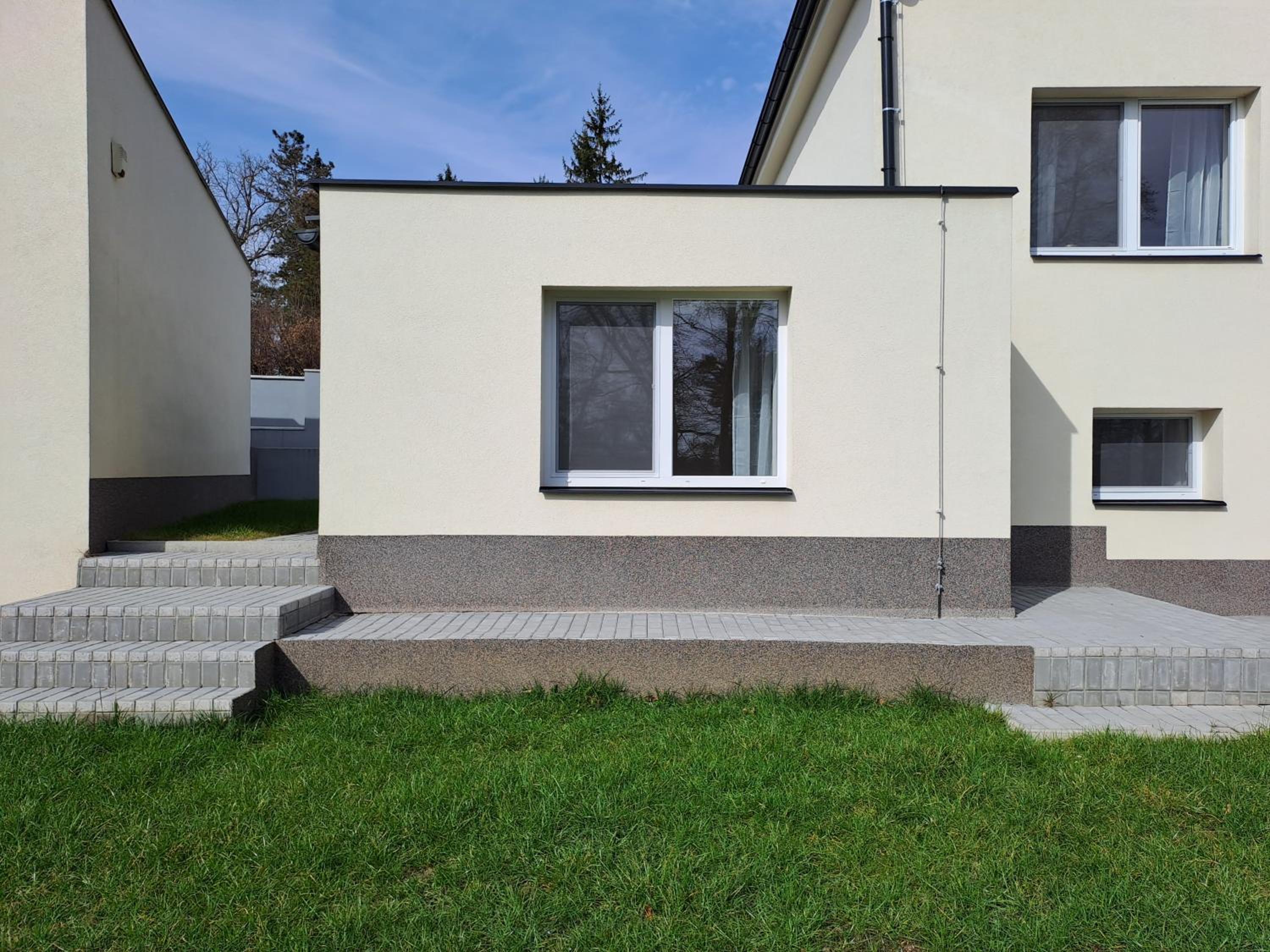 Apartmánový dům se zahradou v klidné části Prahy