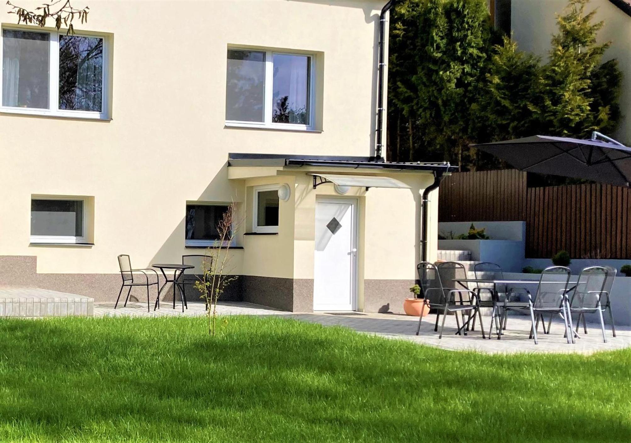 Apartmánový dům se zahradou v klidné části Prahy