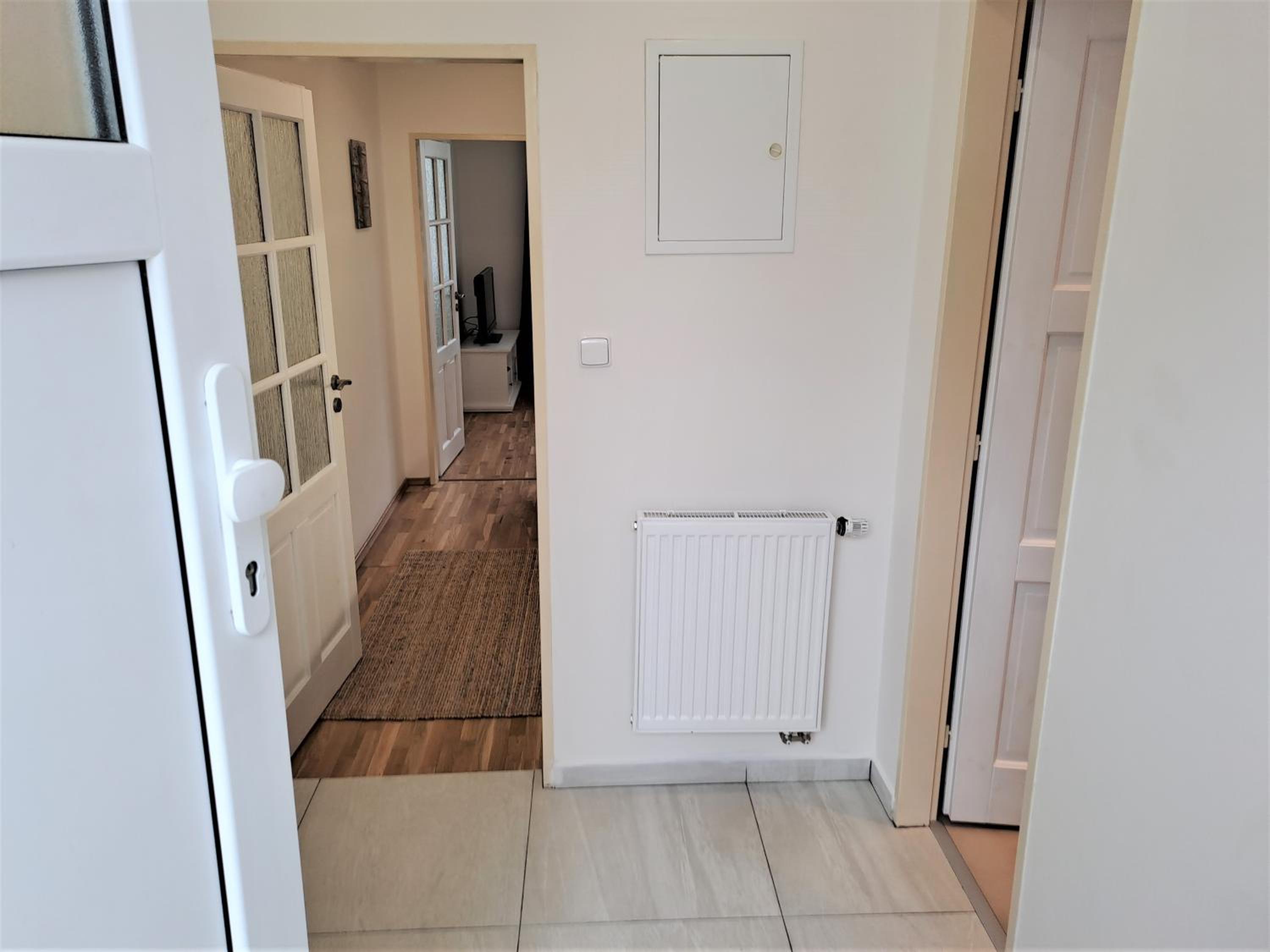 Apartmánový dům se zahradou v klidné části Prahy