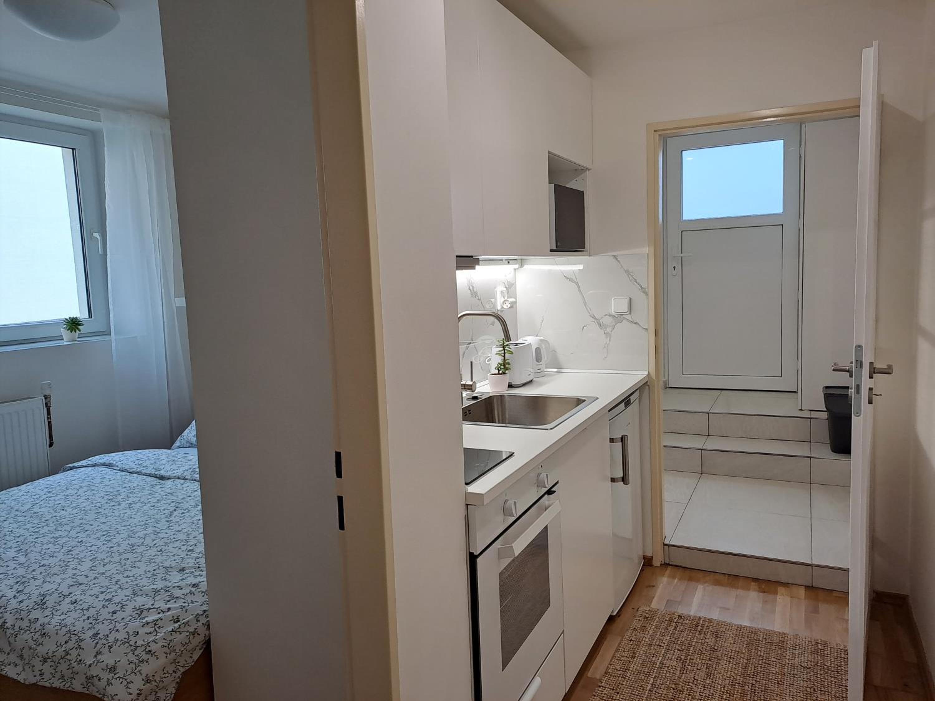 Apartmánový dům se zahradou v klidné části Prahy