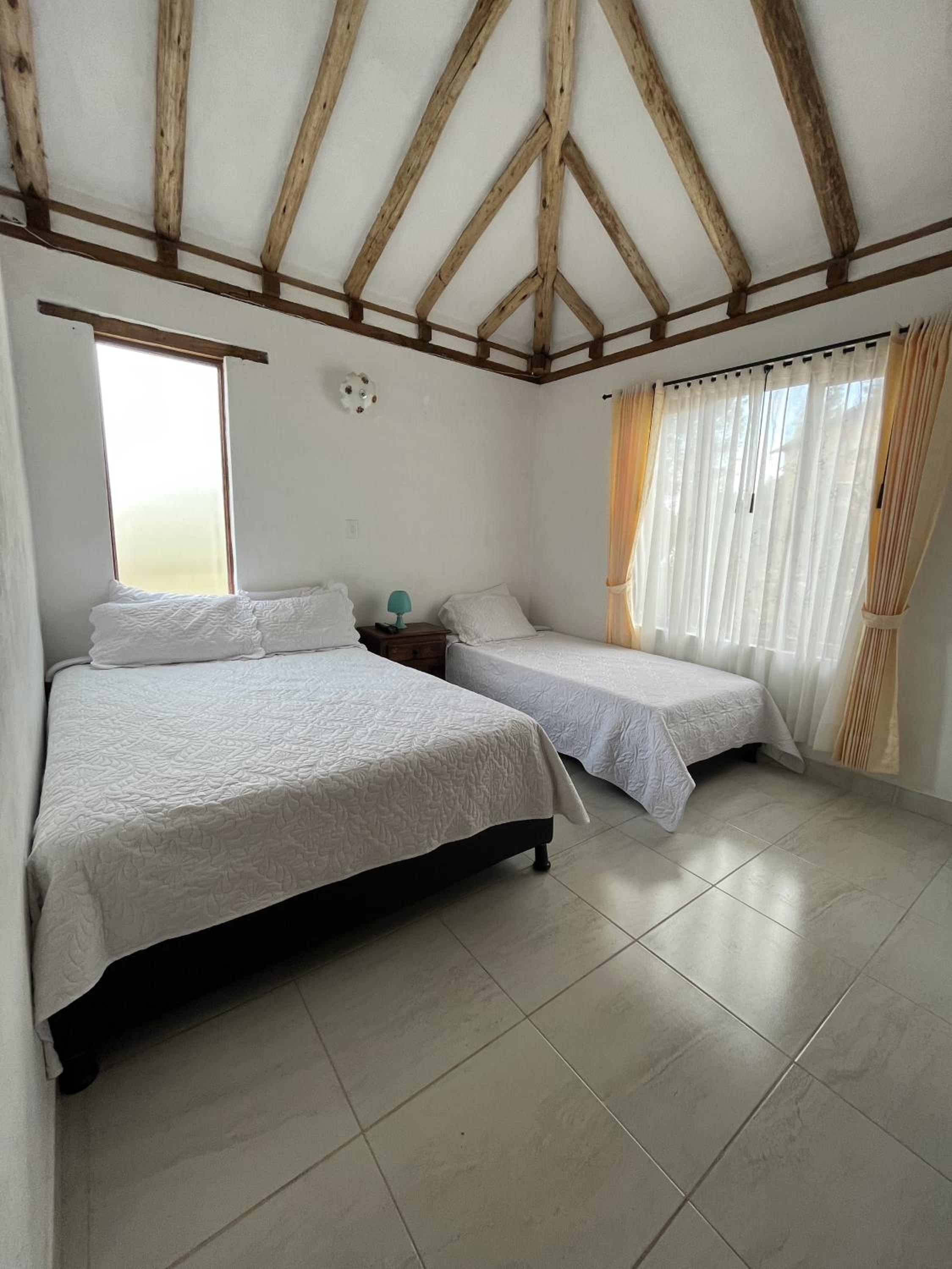 Cuatro habitaciones en la cabaña Quinta Buenos Aires