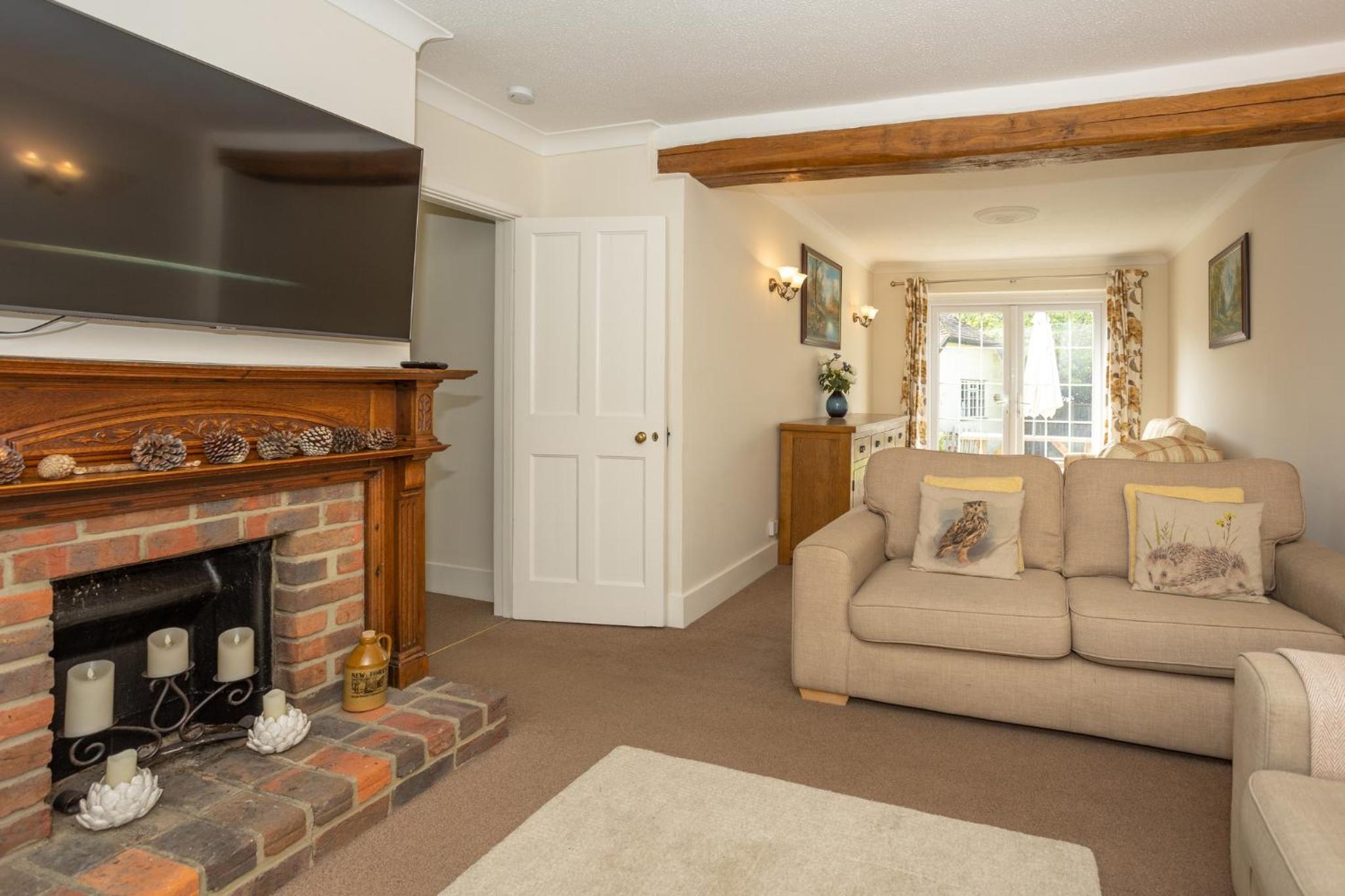 Spacious family cottage with private garden and forest walks