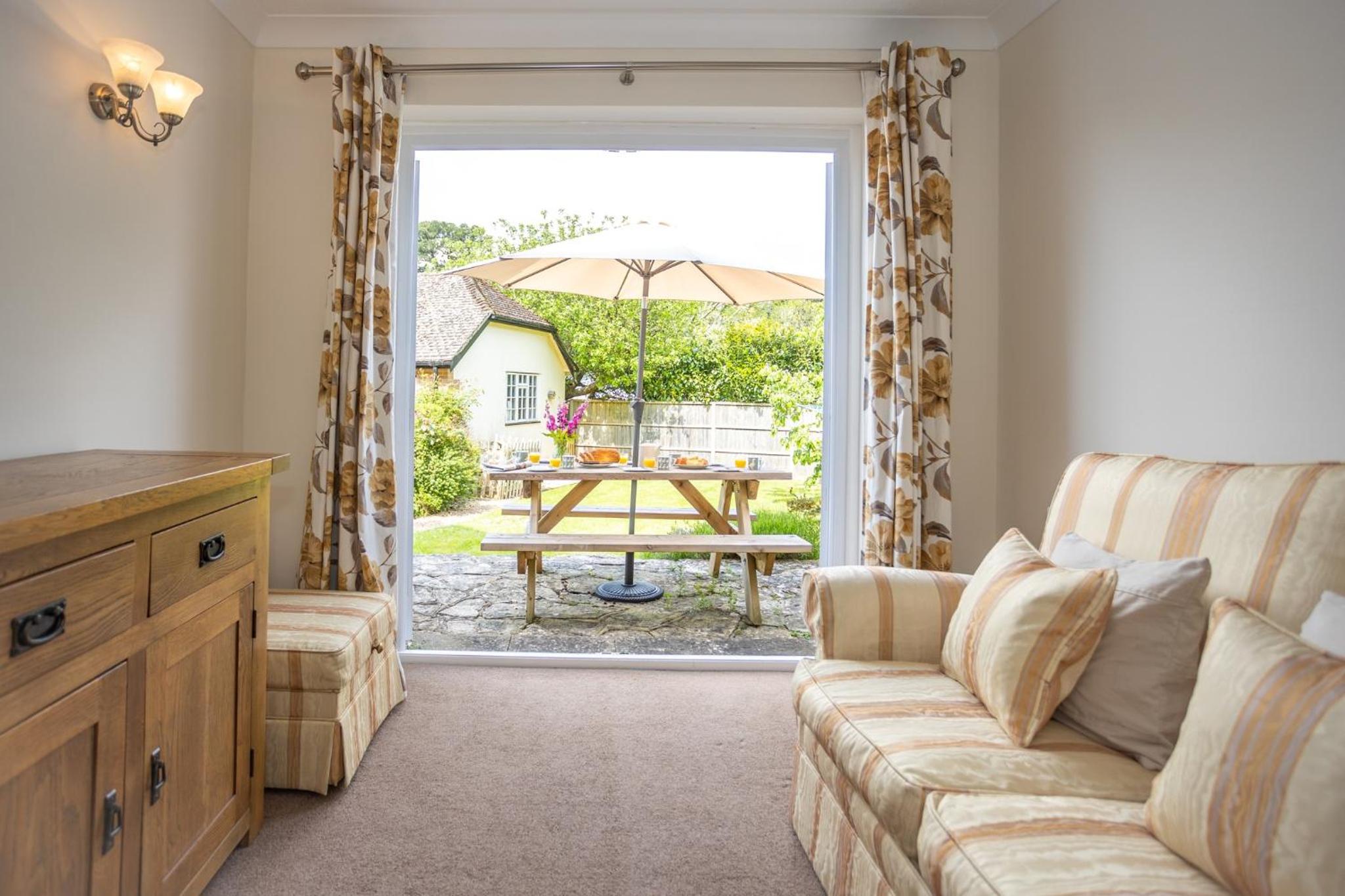 Spacious family cottage with private garden and forest walks