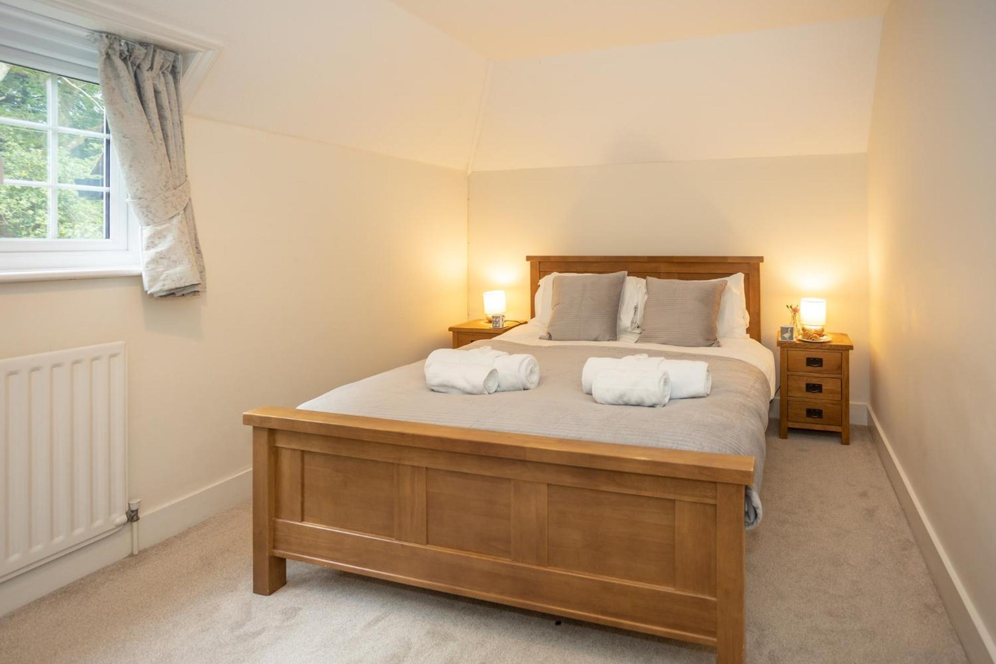Spacious family cottage with private garden and forest walks