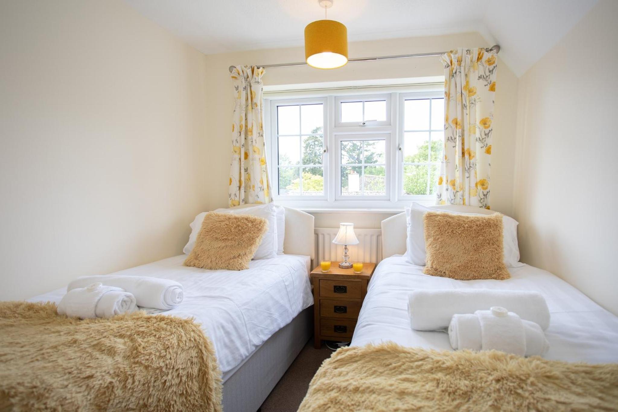 Spacious family cottage with private garden and forest walks