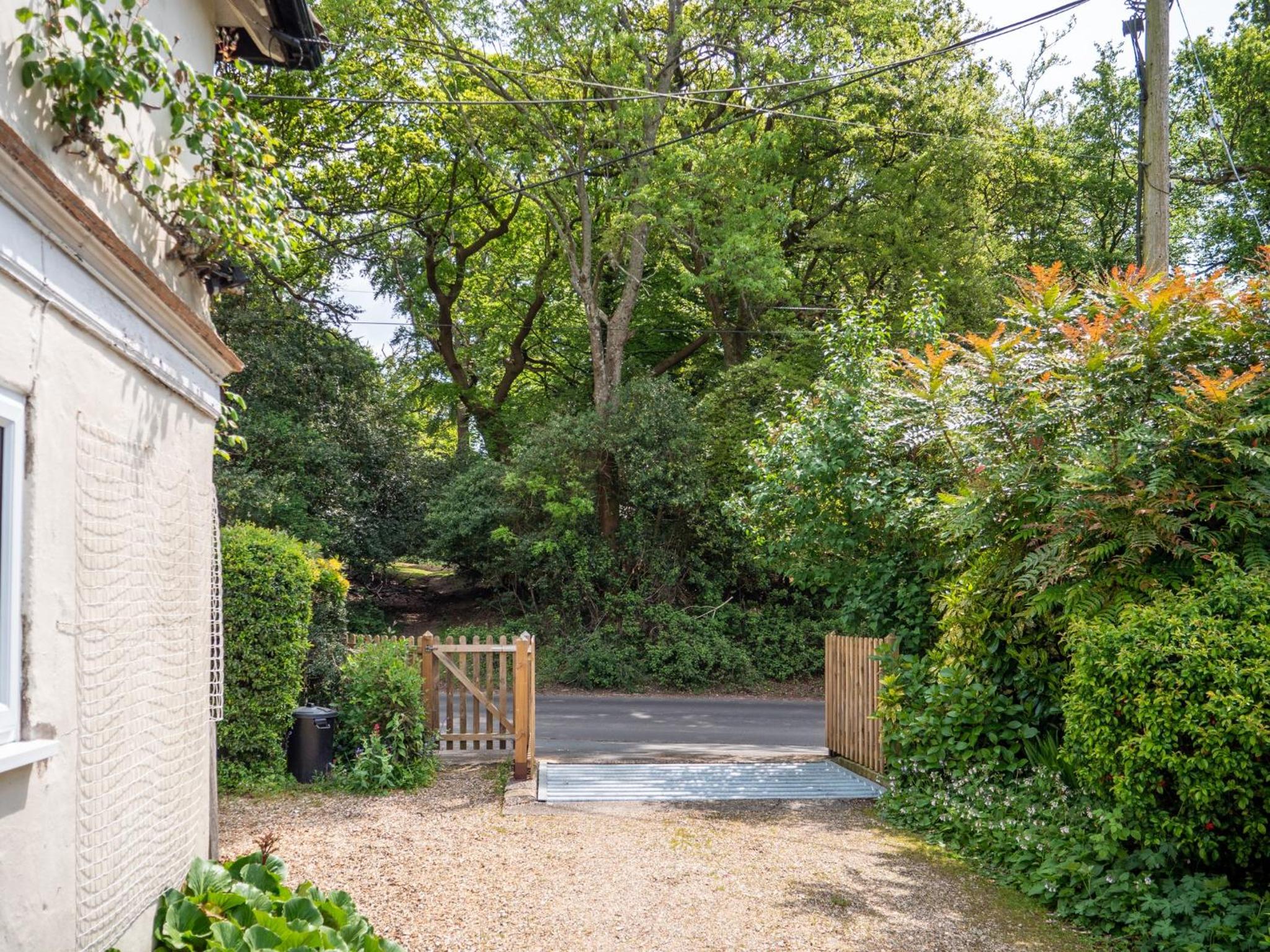 Spacious family cottage with private garden and forest walks