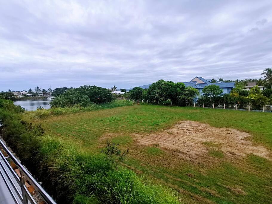 Master Bedroom in Shared Cozy River View Pool Apartment