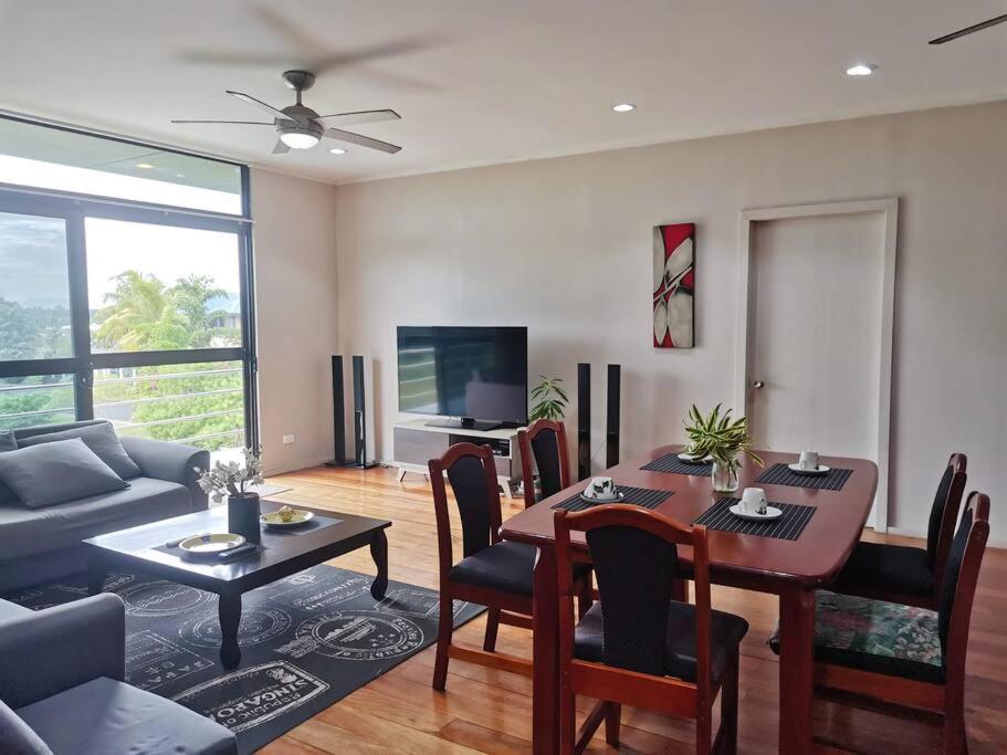 Master Bedroom in Shared Cozy River View Pool Apartment