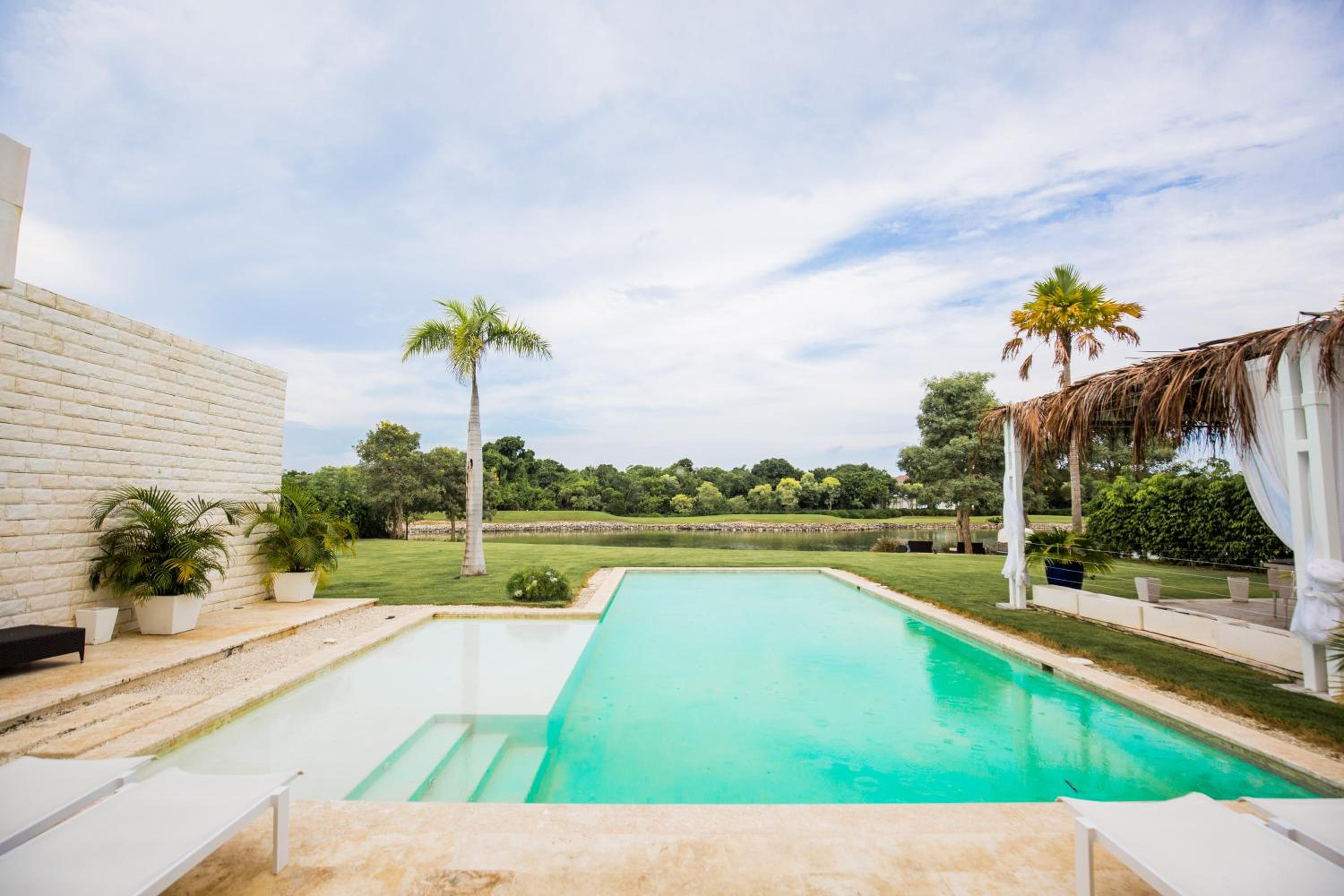 Tranquil Lakefront 5-Bedroom Villa with Cook, Maid, Golf Cart, and Beach Access in Punta Cana view 5