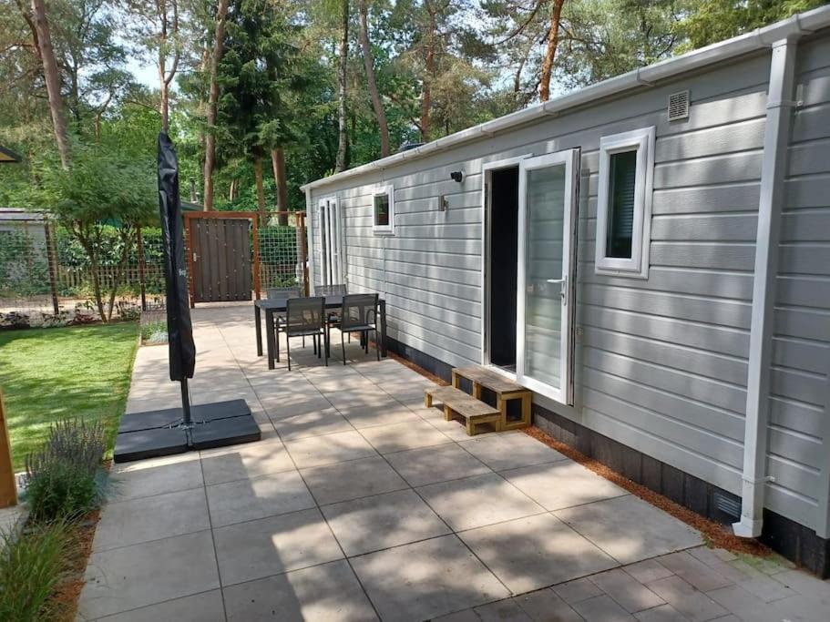 Boshuis met grote tuin I Vakantiepark met Zwembad view 4