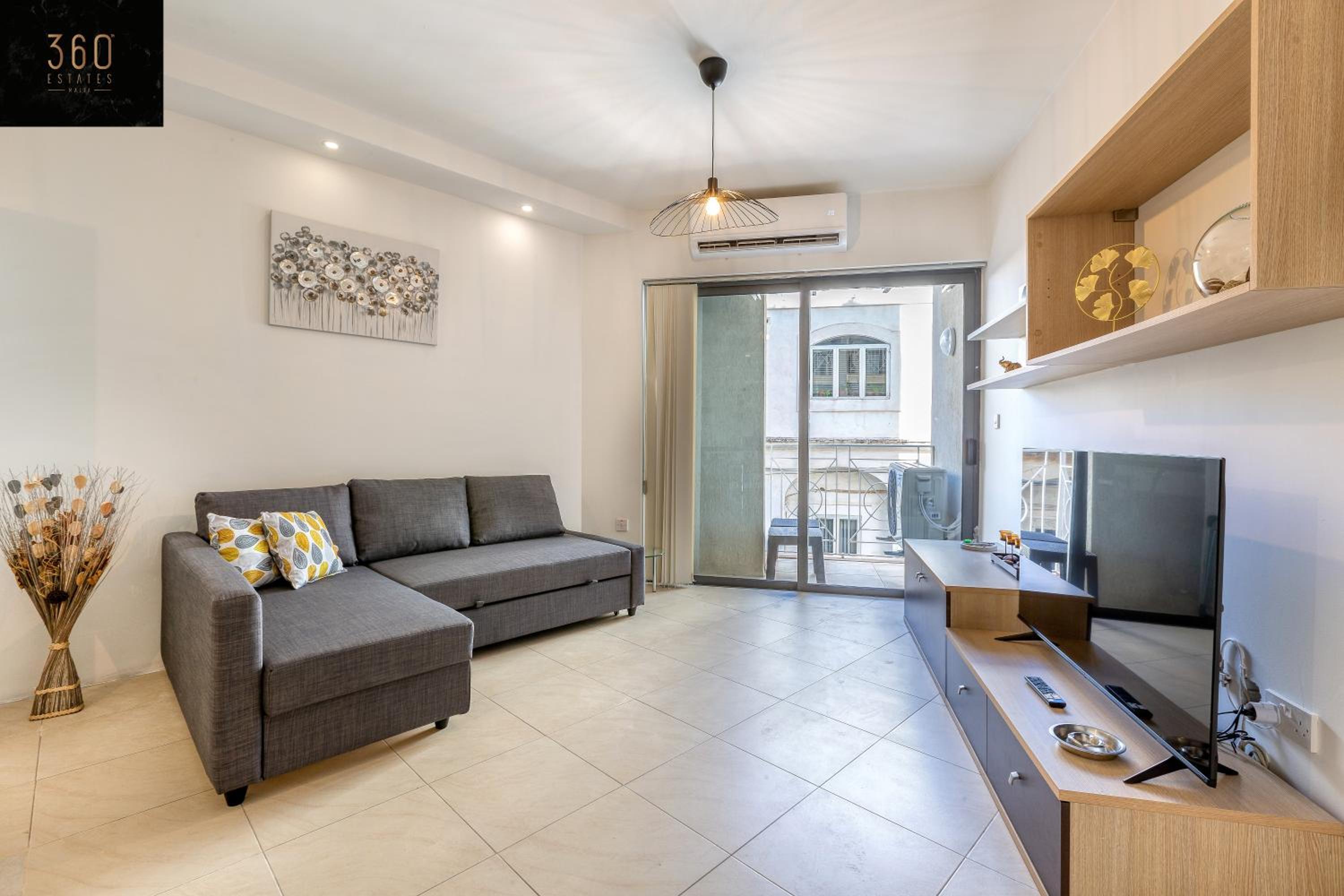 Wonderful, designer 2BR home with large Sofa & TV by 360 Estates — St Julian's