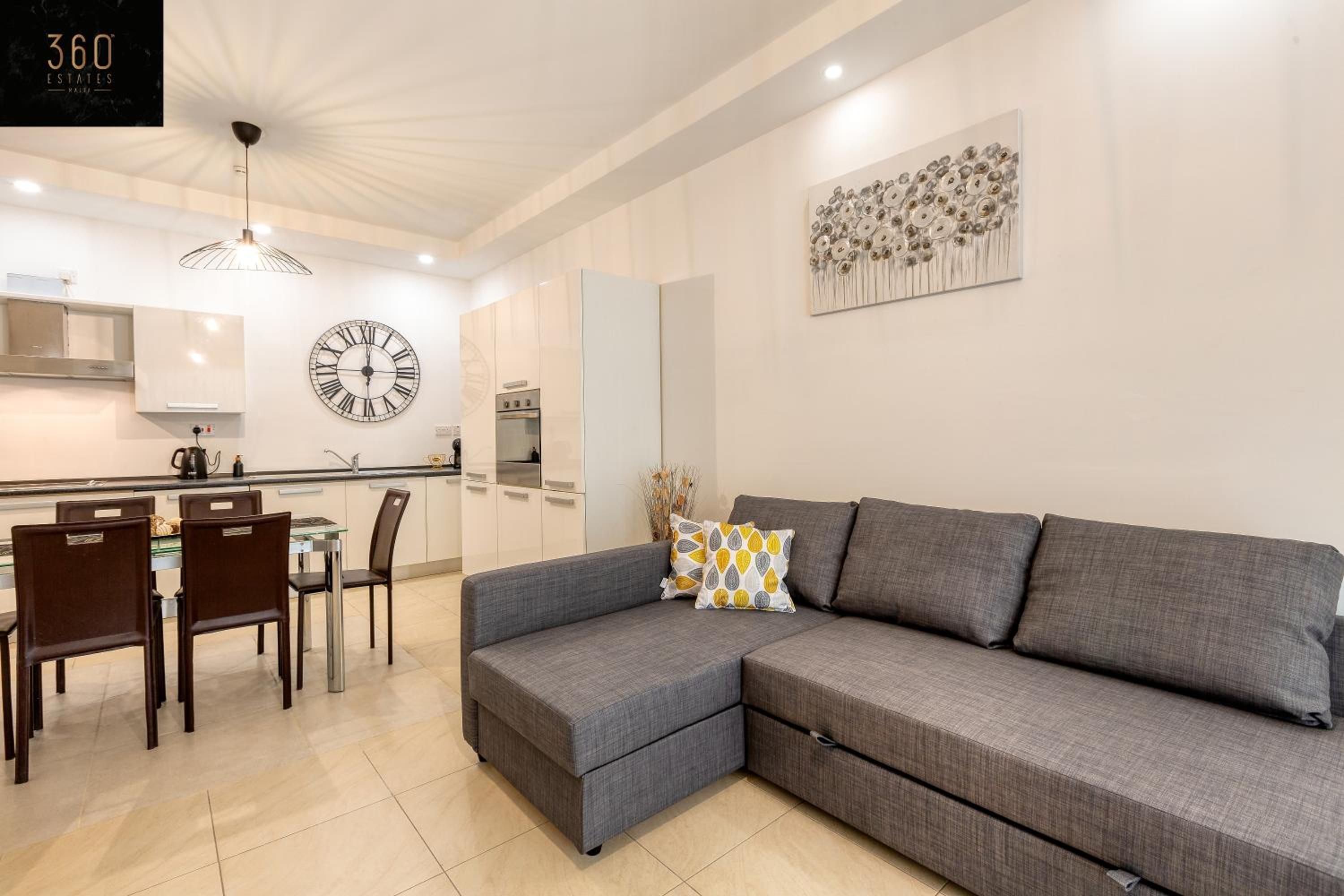Wonderful, designer 2BR home with large Sofa & TV by 360 Estates photo 4