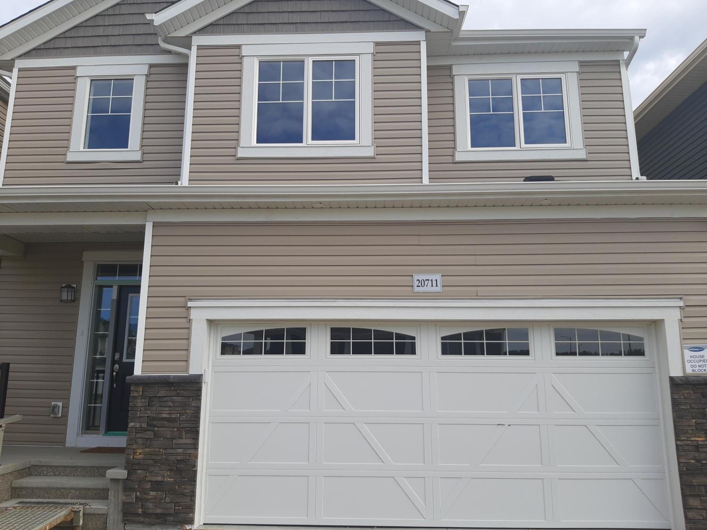 A cozy 3 bedroom new house with 2 living rooms