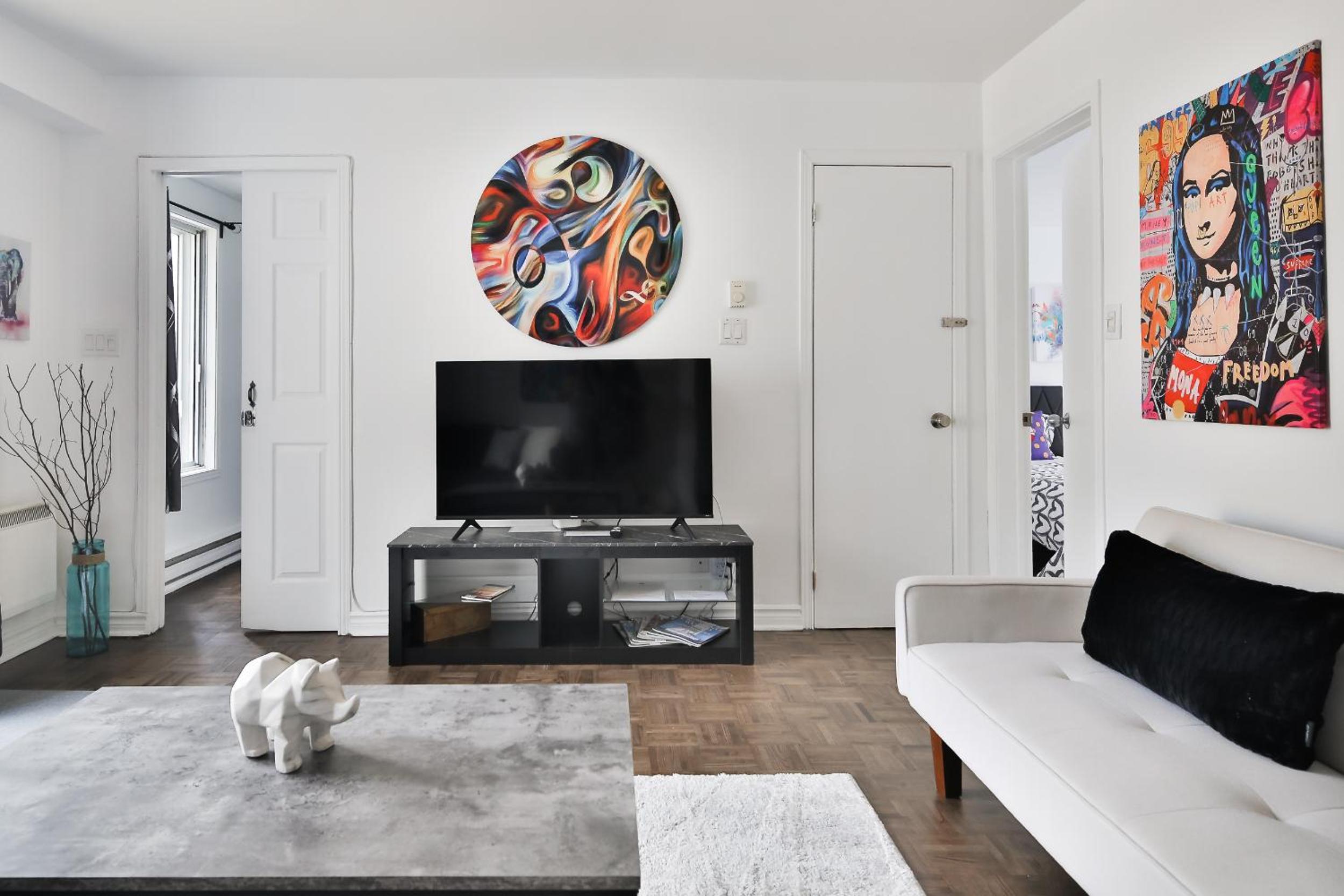 250 METERS to METRO BERRI UQAM - Spacious fully equipped APARTMENTS - 1 FREE PARKING per unit - in-unit Washer & Dryer - fully stocked KITCHEN - WORKSPACE 