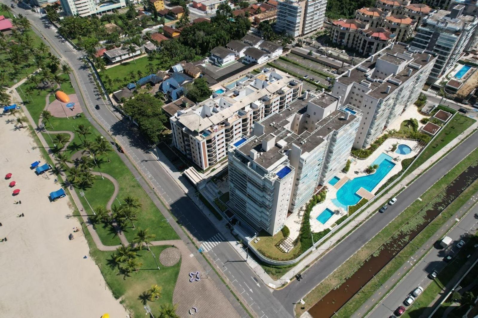 Home 43| Apto em cond Pé na Areia em Bertioga