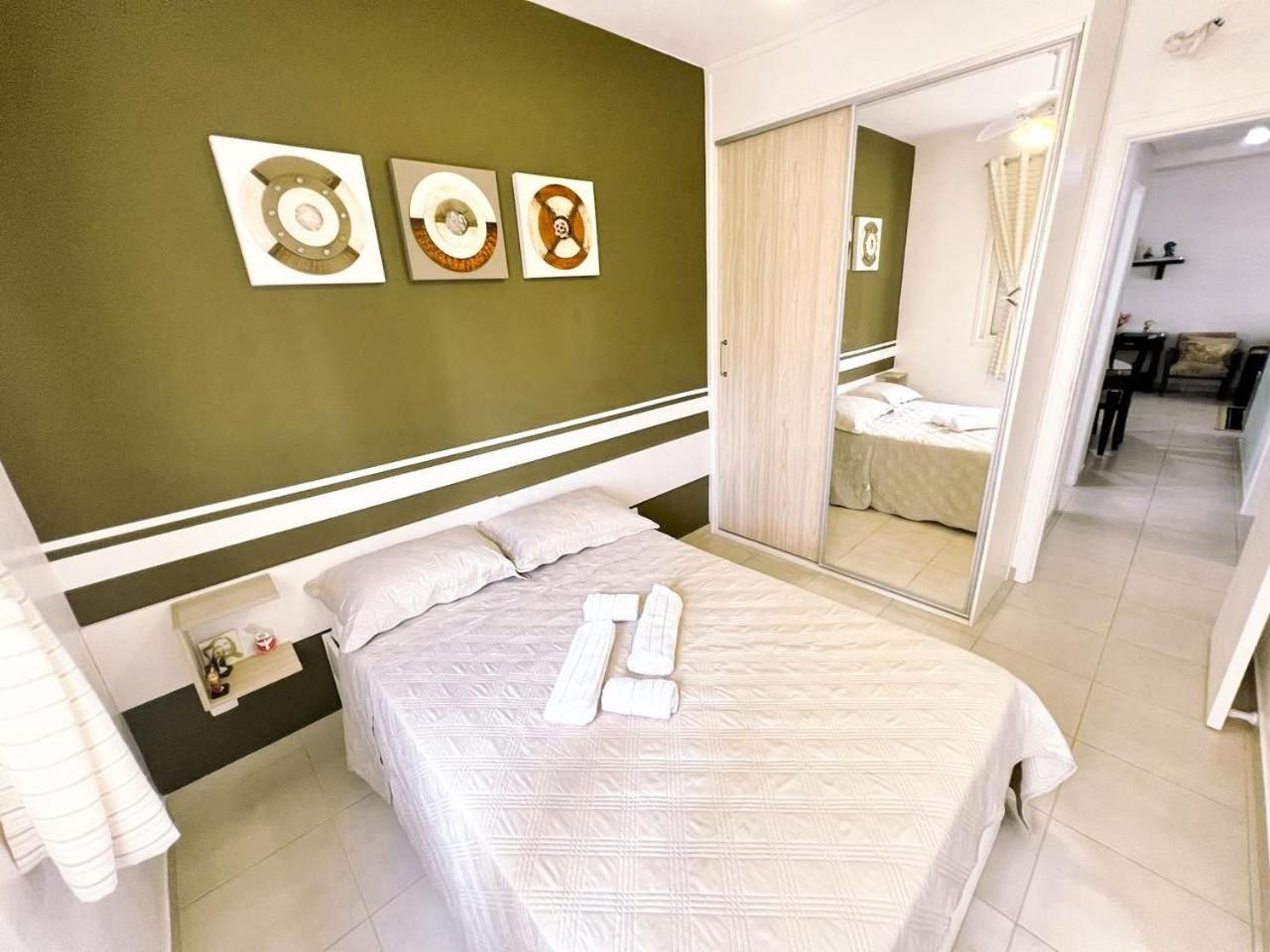 Home 43| Apto em cond Pé na Areia em Bertioga