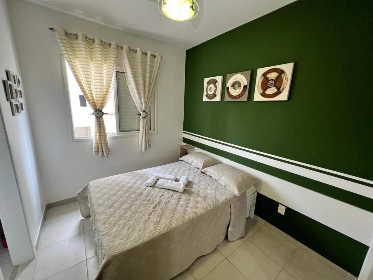 Home 43| Apto em cond Pé na Areia em Bertioga