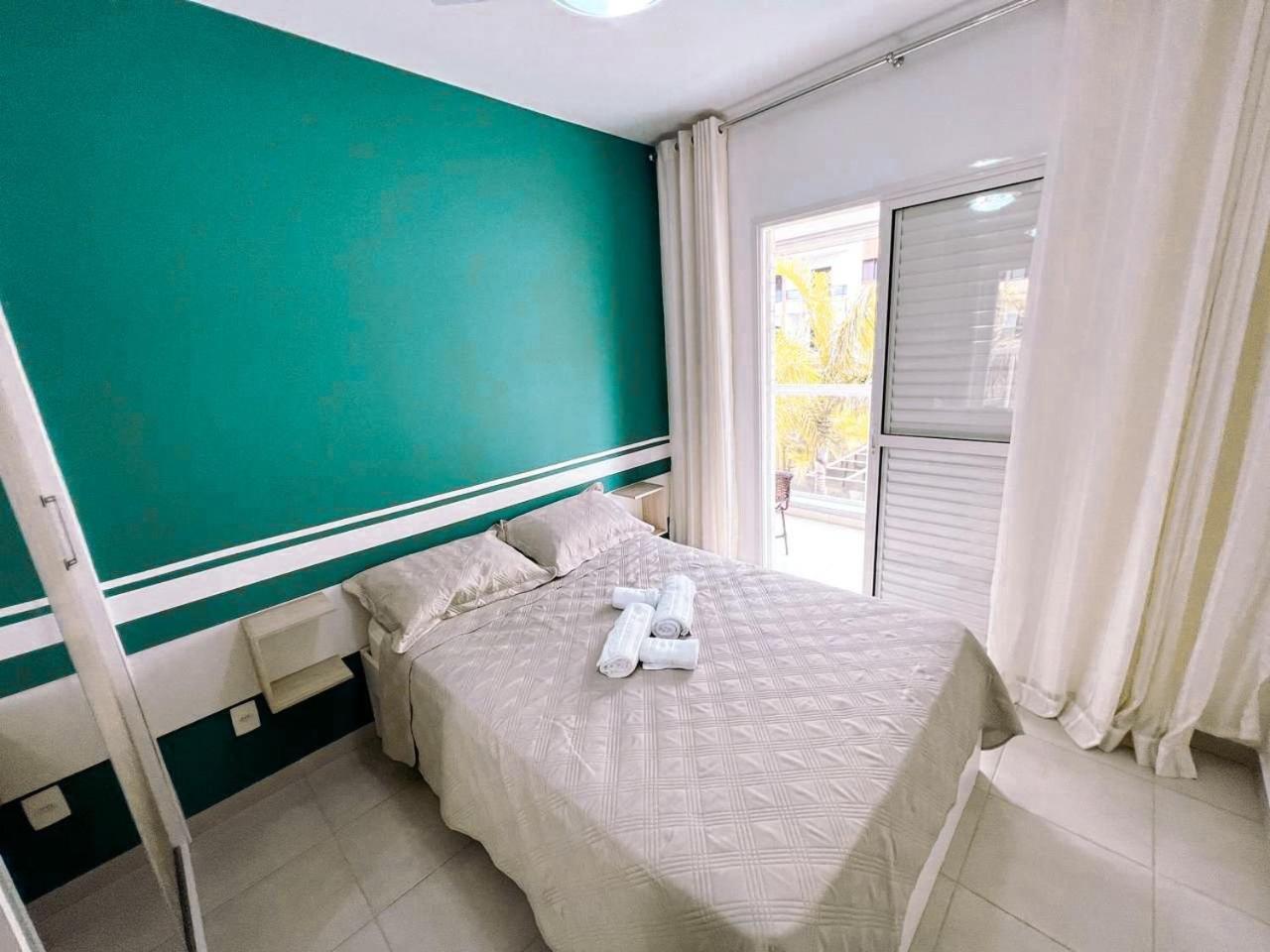 Home 43| Apto em cond Pé na Areia em Bertioga