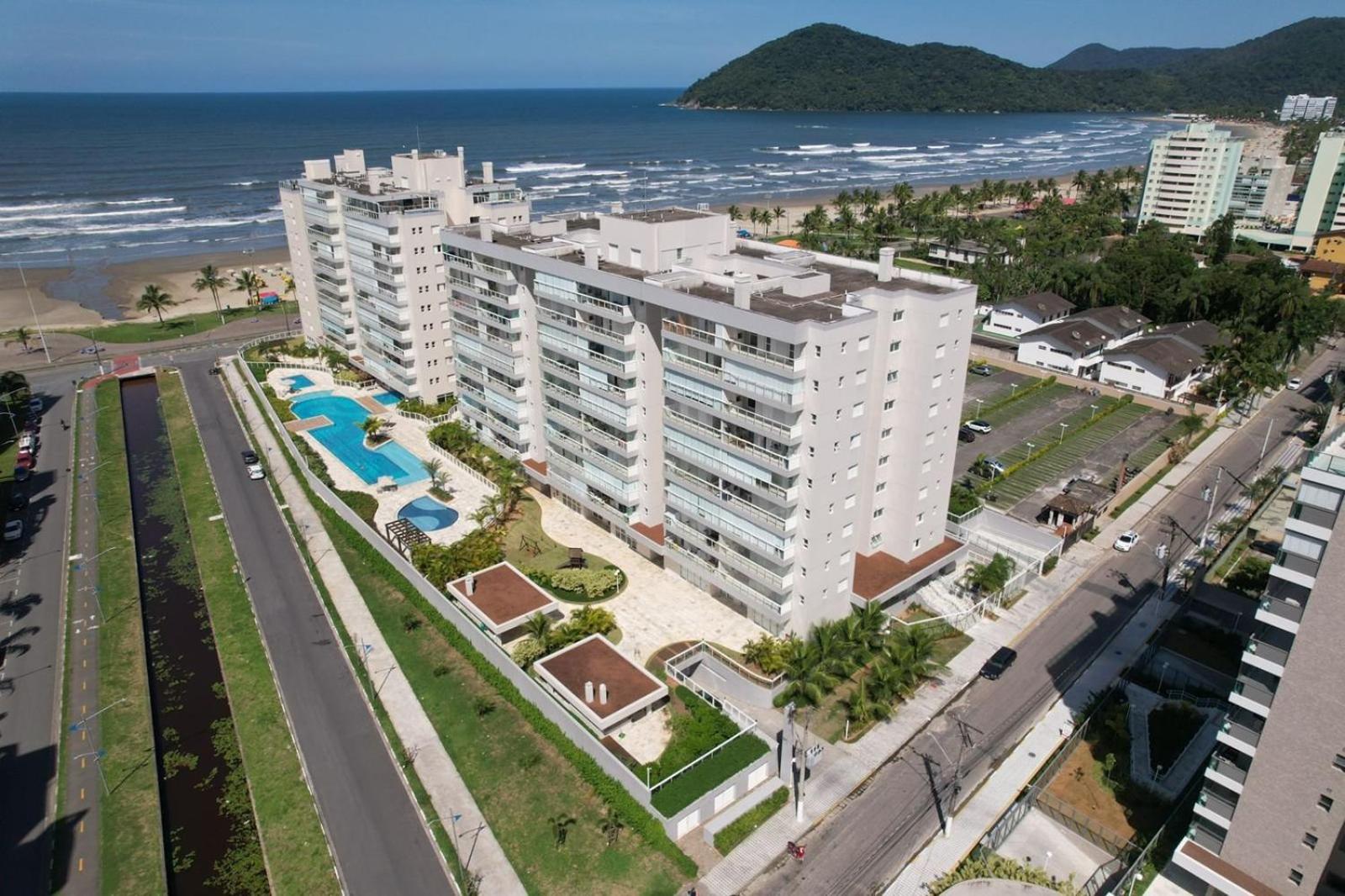 Home 43| Apto em cond Pé na Areia em Bertioga