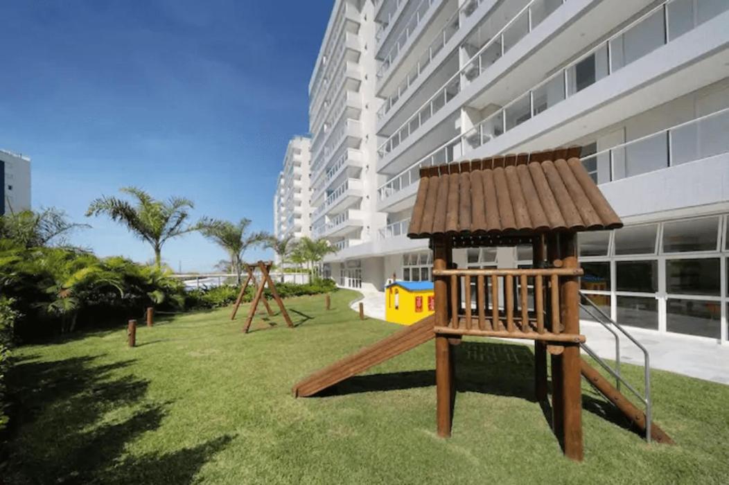Home 43| Apto em cond Pé na Areia em Bertioga