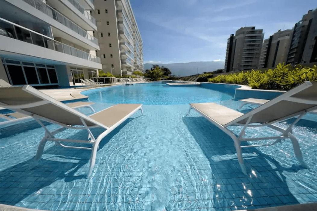 Home 43| Apto em cond Pé na Areia em Bertioga