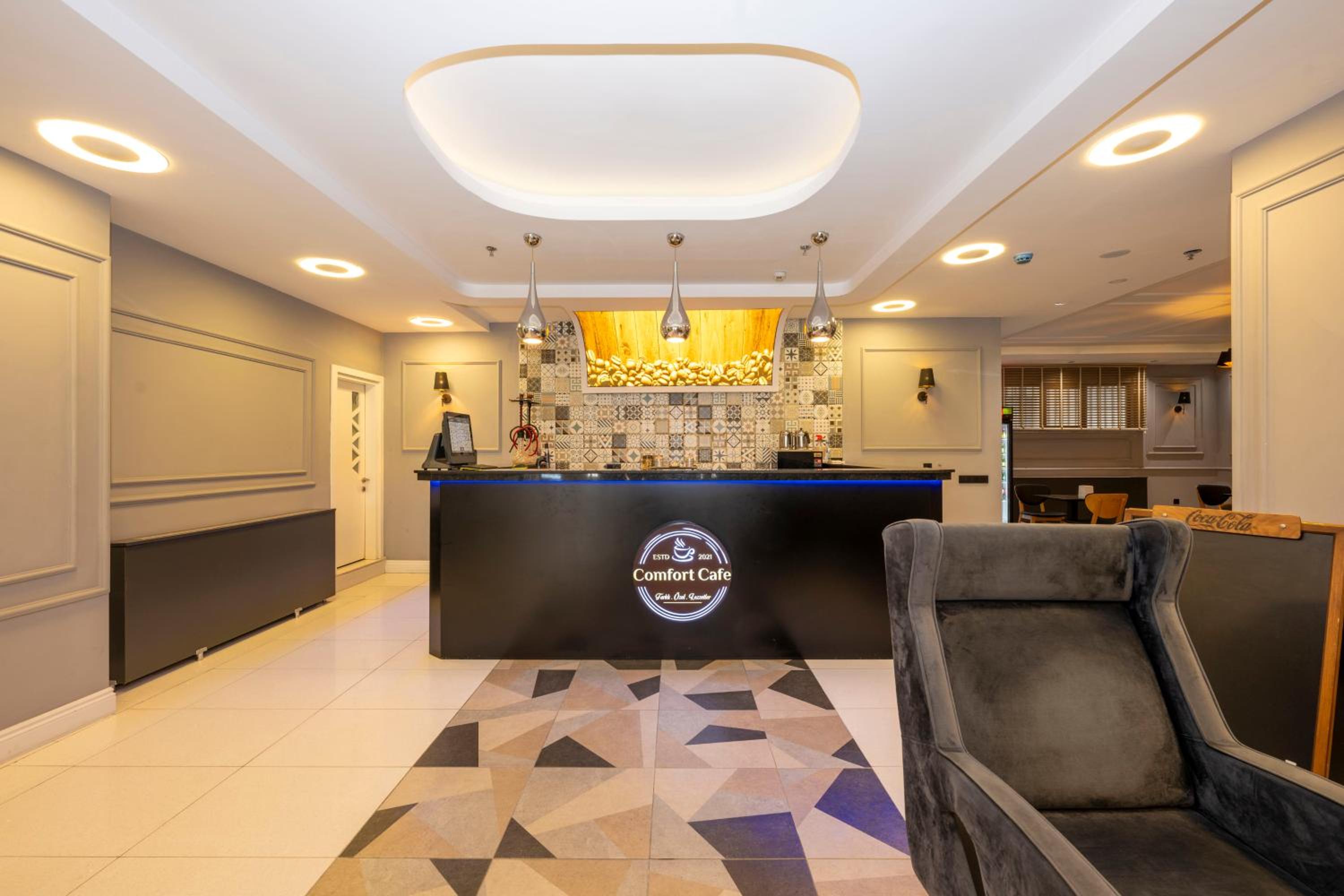 Comfort Suites Otel - Image 8