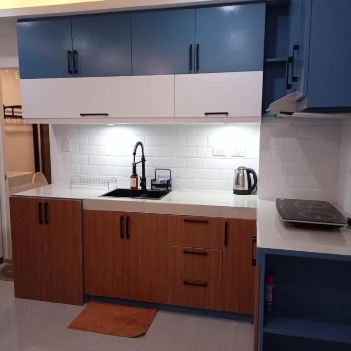 Balai ni Boss - Cozy Modern 1BR in Victoria Sports Tower view 2